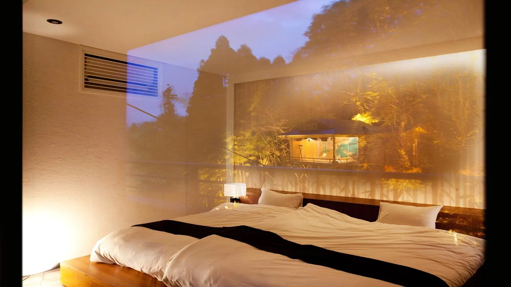 Bed in Premium Suites Matsushimakaku Produced by Shousuke no Yado Takinoyu