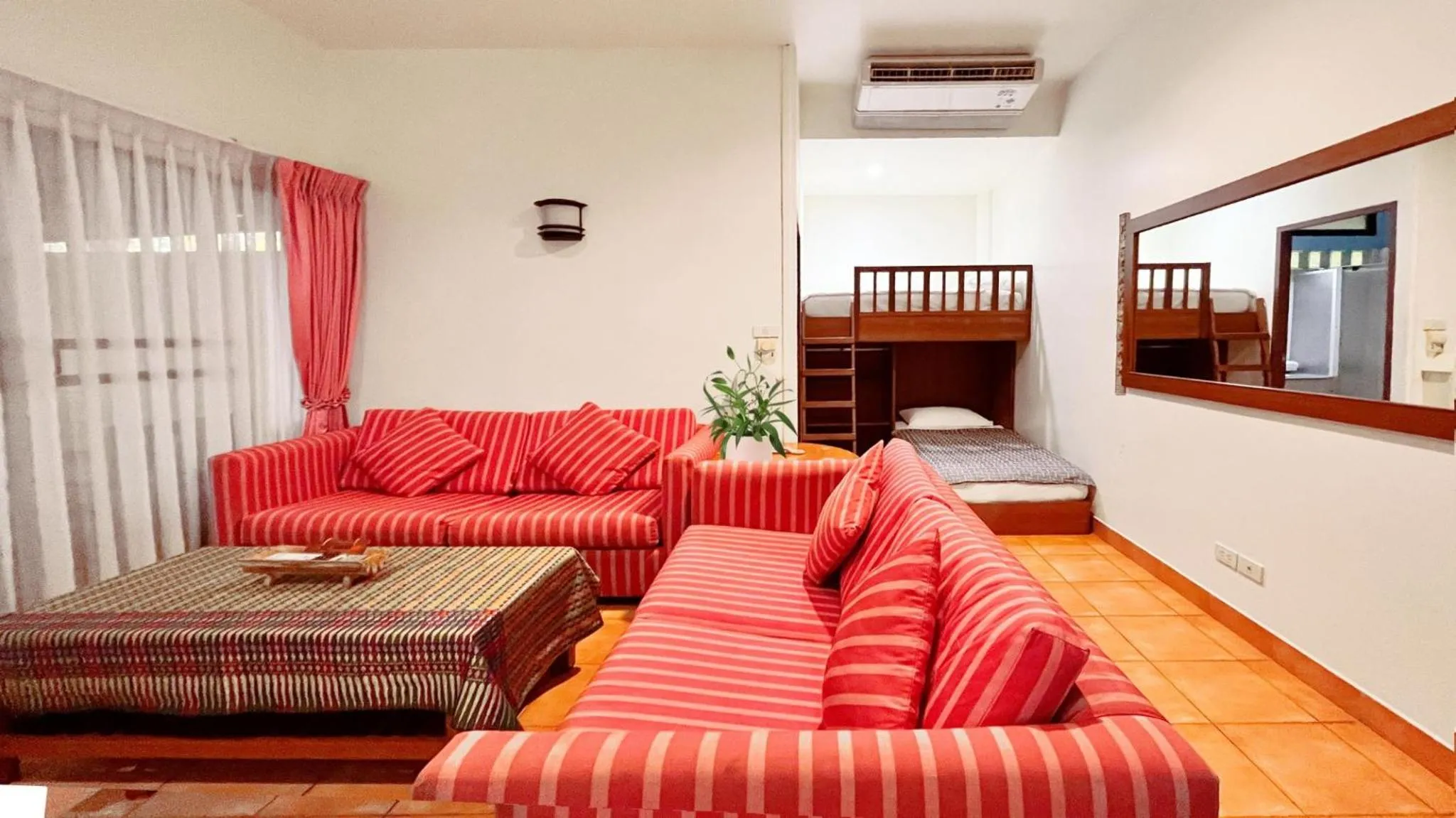 Seating area, Bed in Birds and Bees Resort