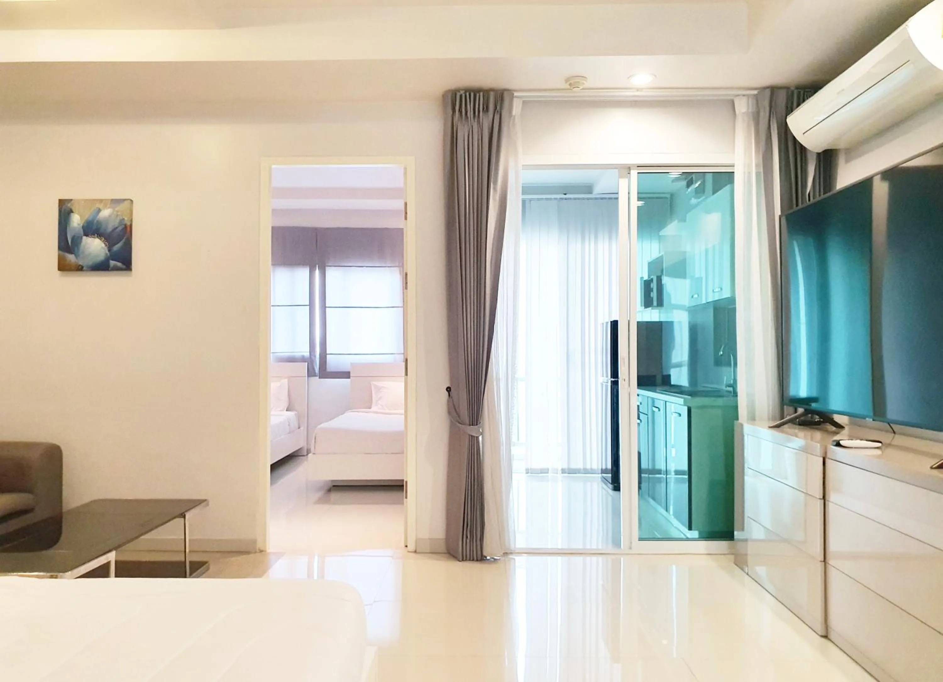 Photo of the whole room, Bed in The Sriracha Residence