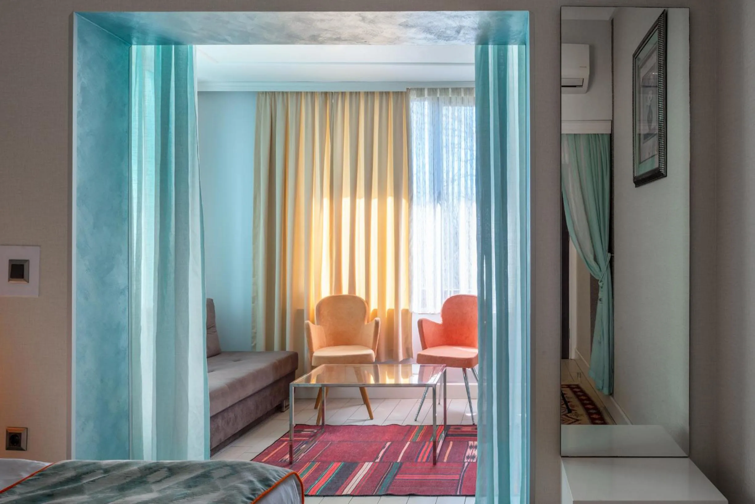 Seating area, Bed in Delight Deluxe Aparts