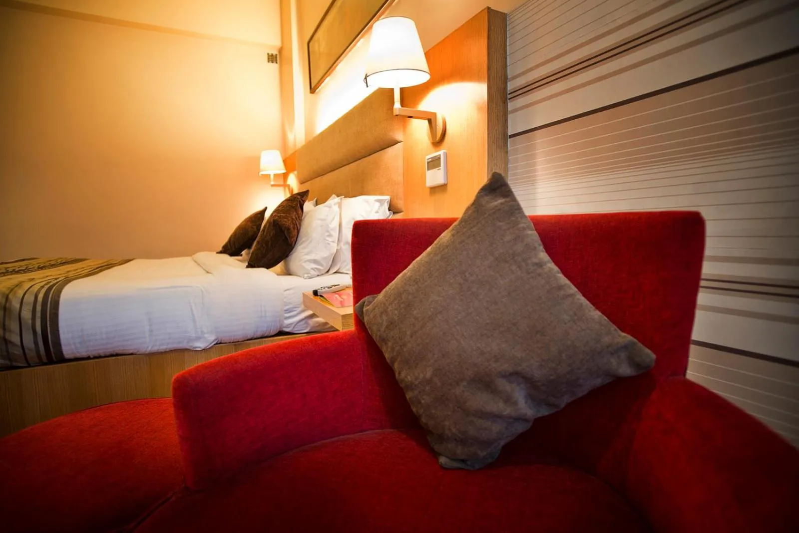 Living room, Bed in The Manor Bareilly by Leisure Hotels