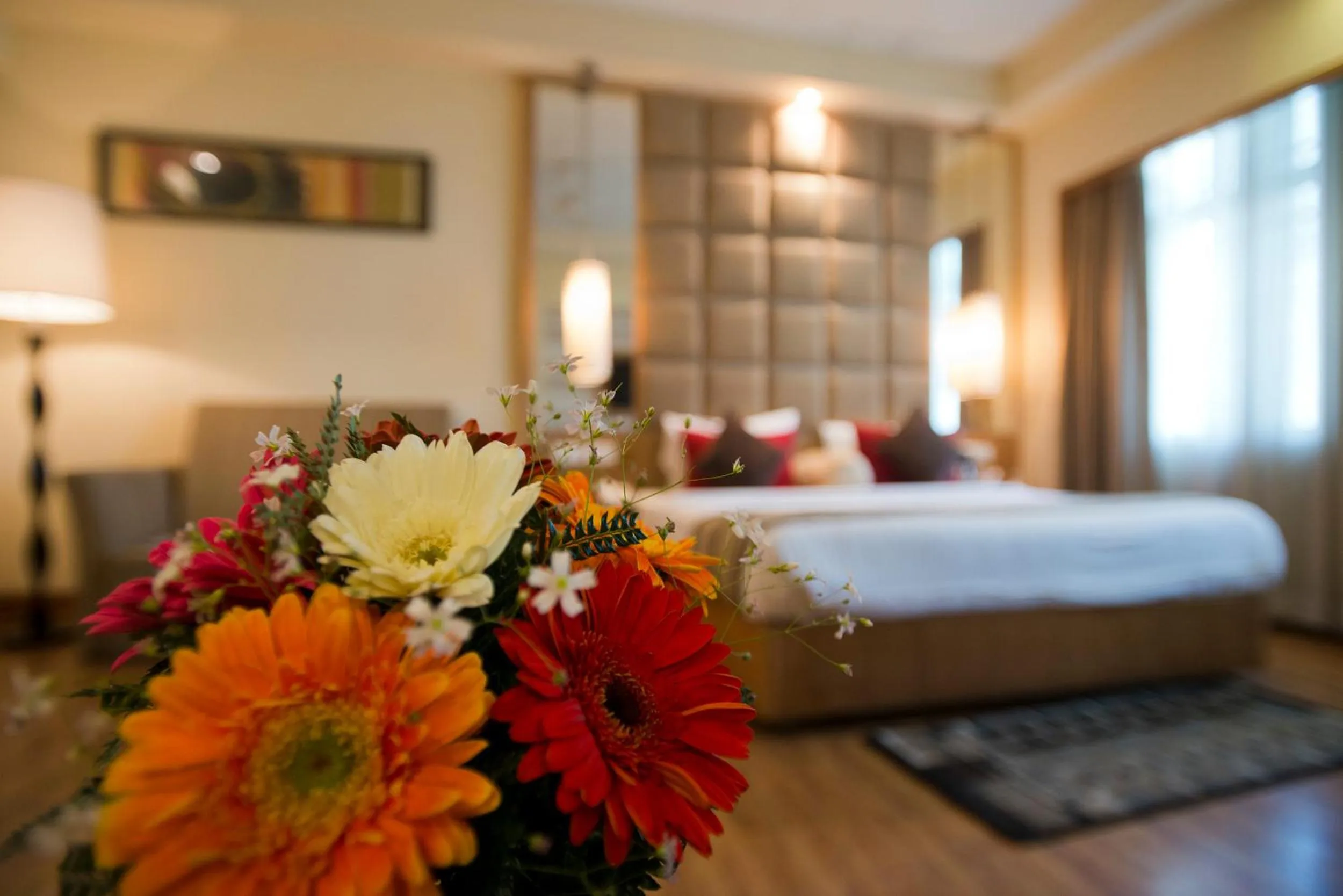 Living room, Bed in The Manor Bareilly by Leisure Hotels