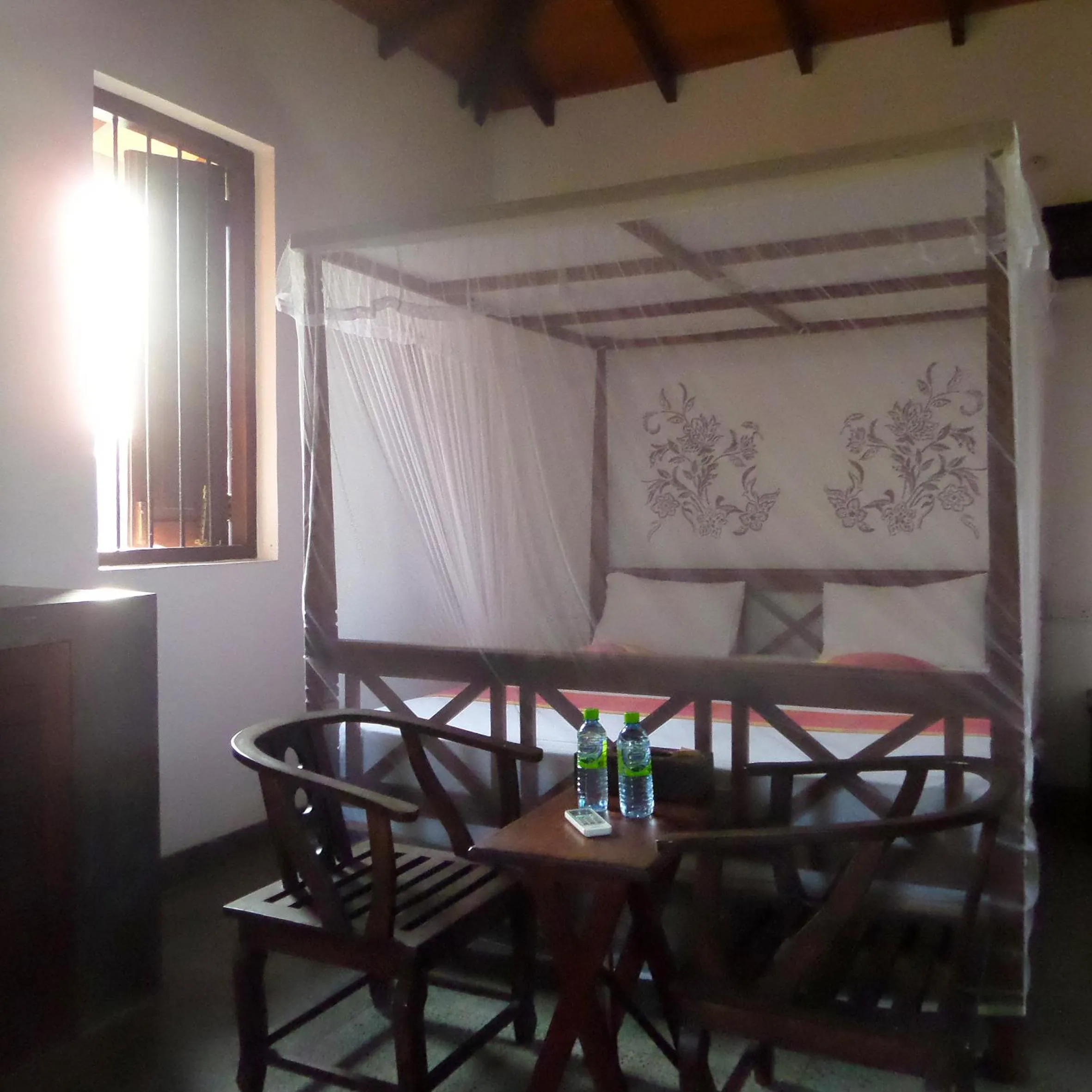 Bed, Seating Area in Lagoon Boutique Hotel
