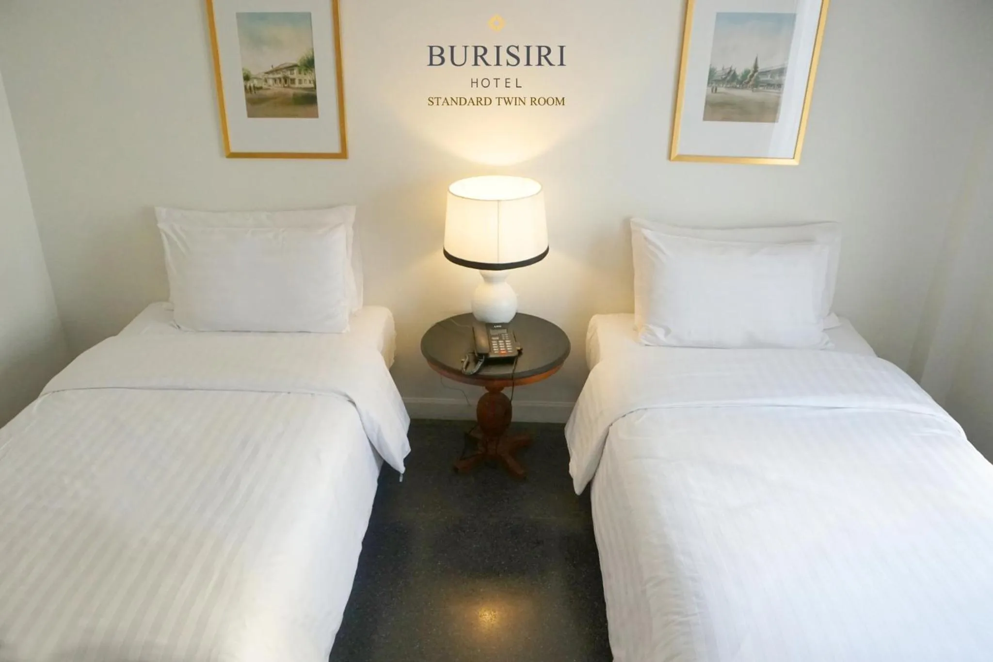 Bed in Buri Siri Boutique Hotel