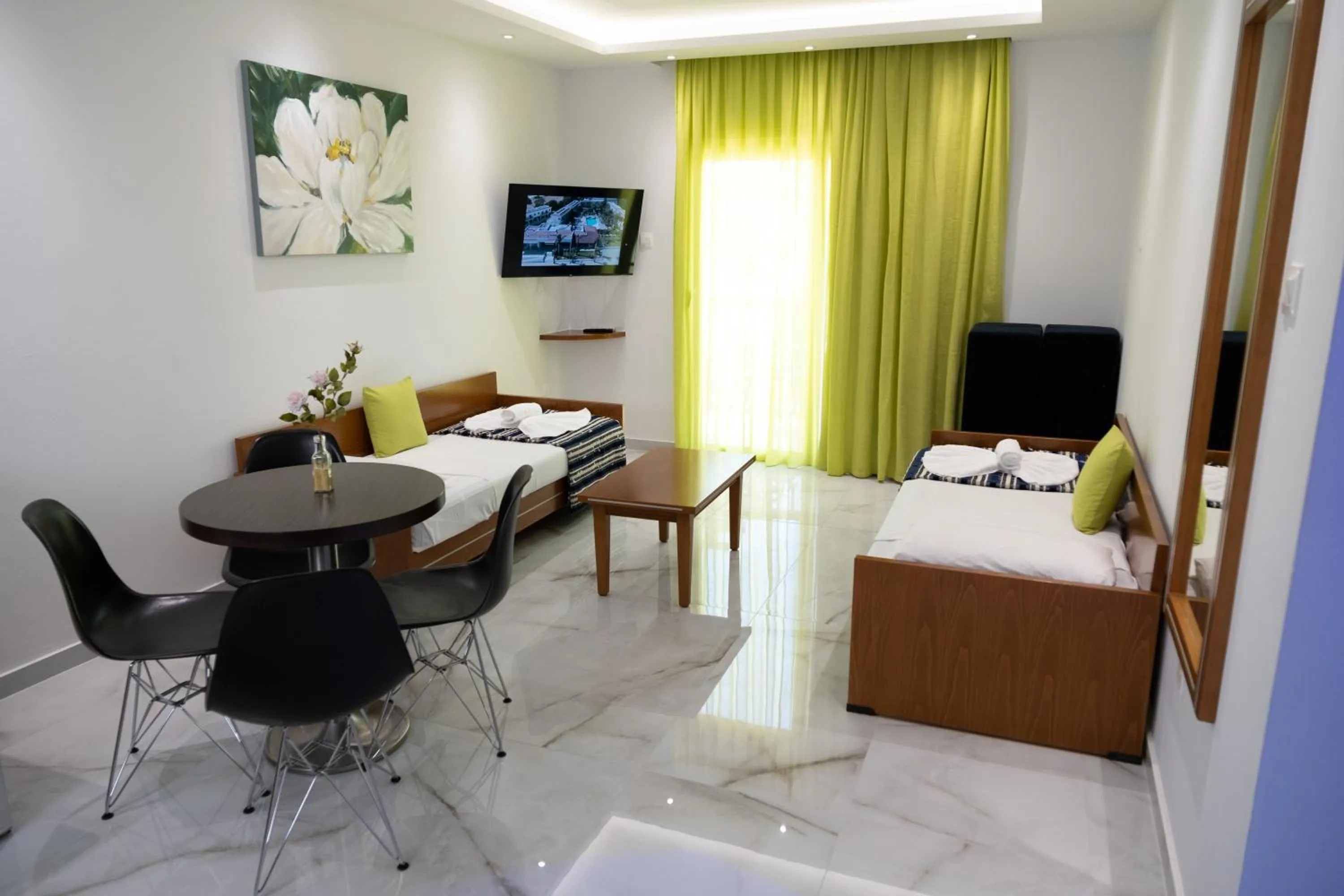 Bed in Loutsiana Deluxe Apts