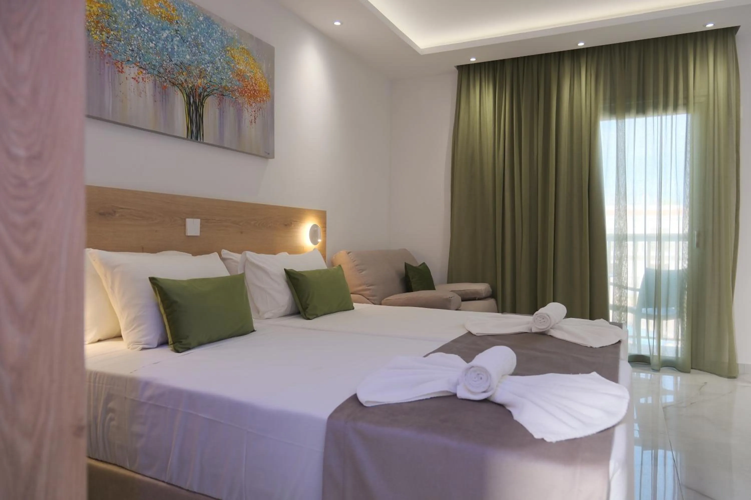 Bed in Loutsiana Deluxe Apts