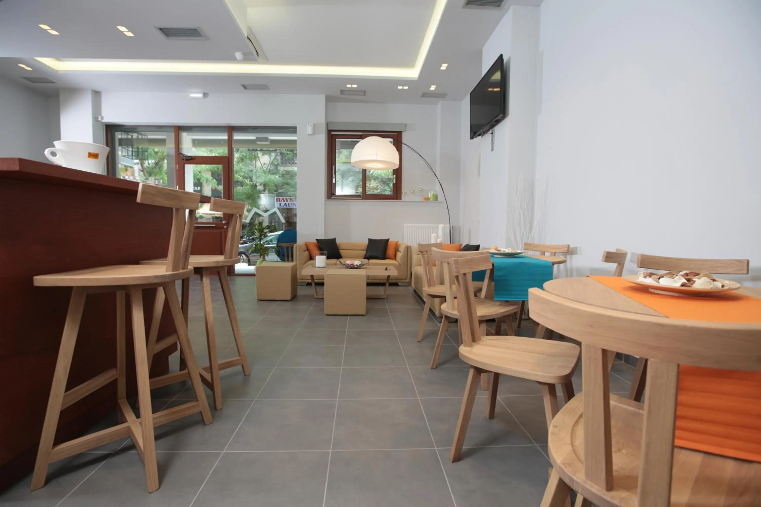 Communal lounge/ TV room in Meni Apartments