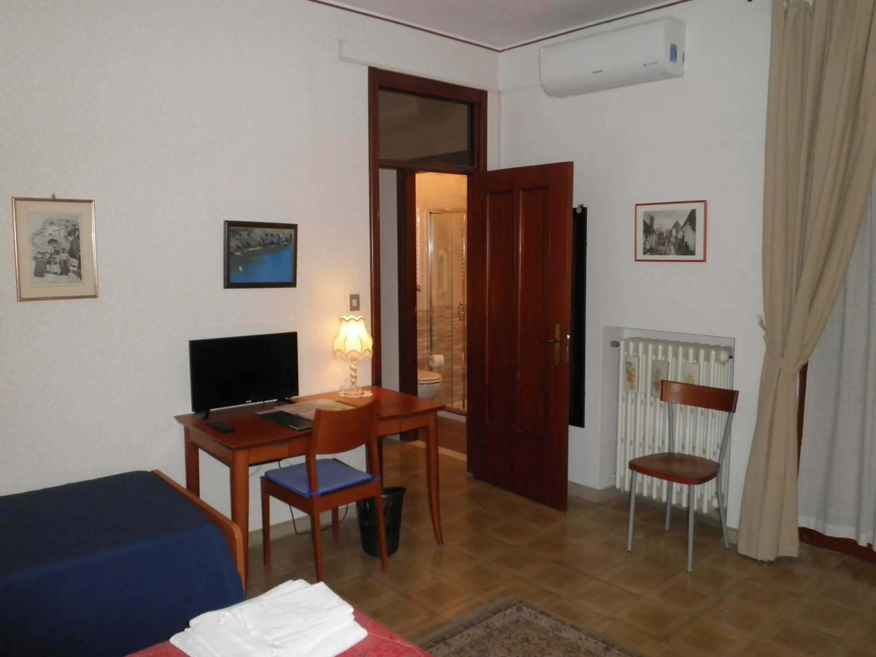 Photo of the whole room, Bed in Don Milani