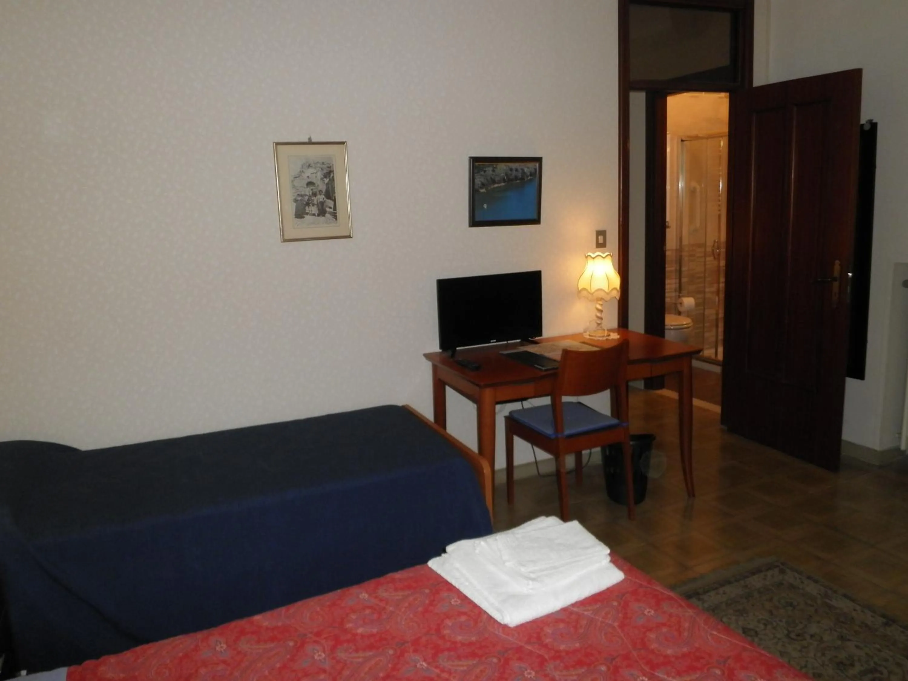 Photo of the whole room, Bed in Don Milani