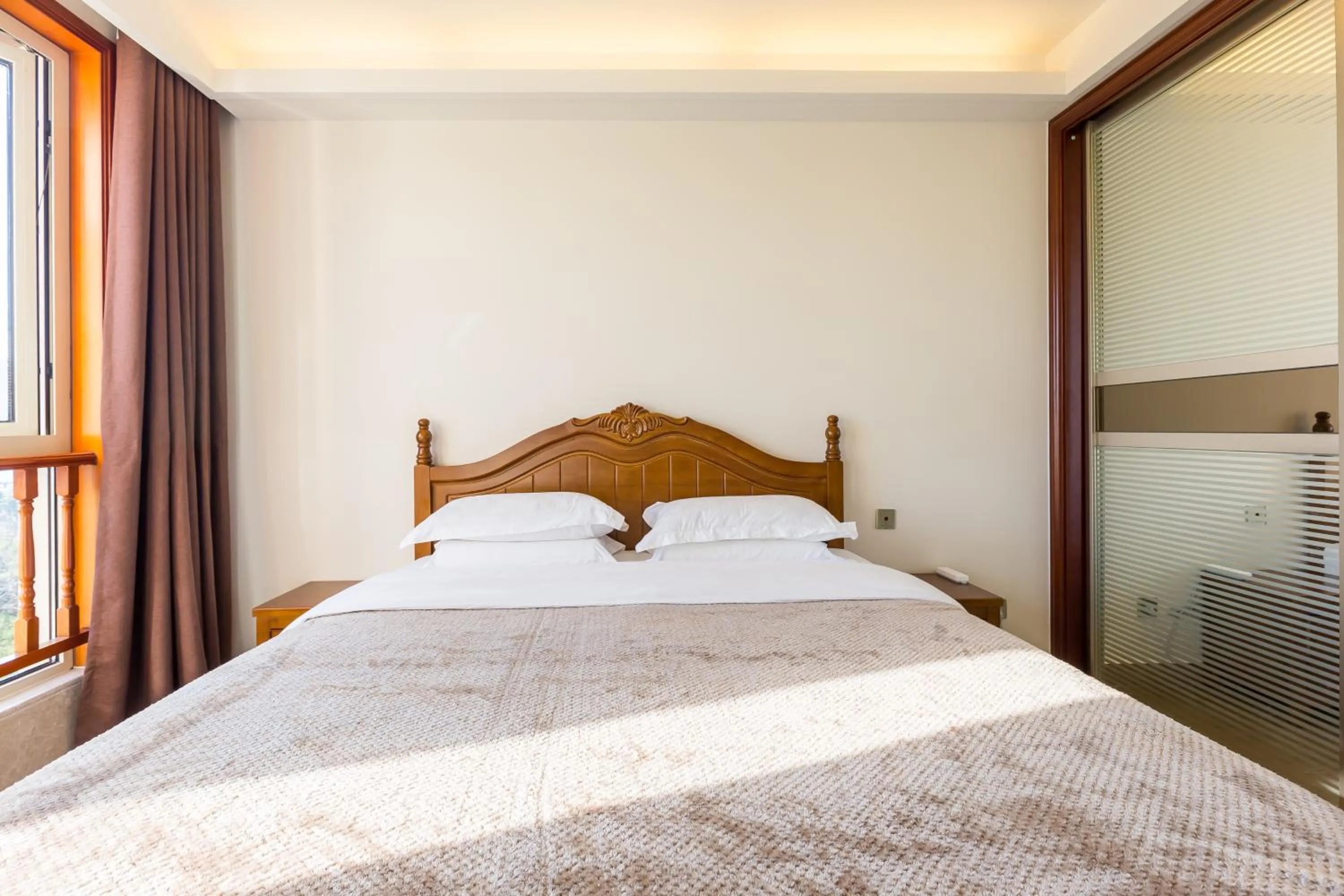 Bedroom, Bed in Sanya Yikehai View Apartments