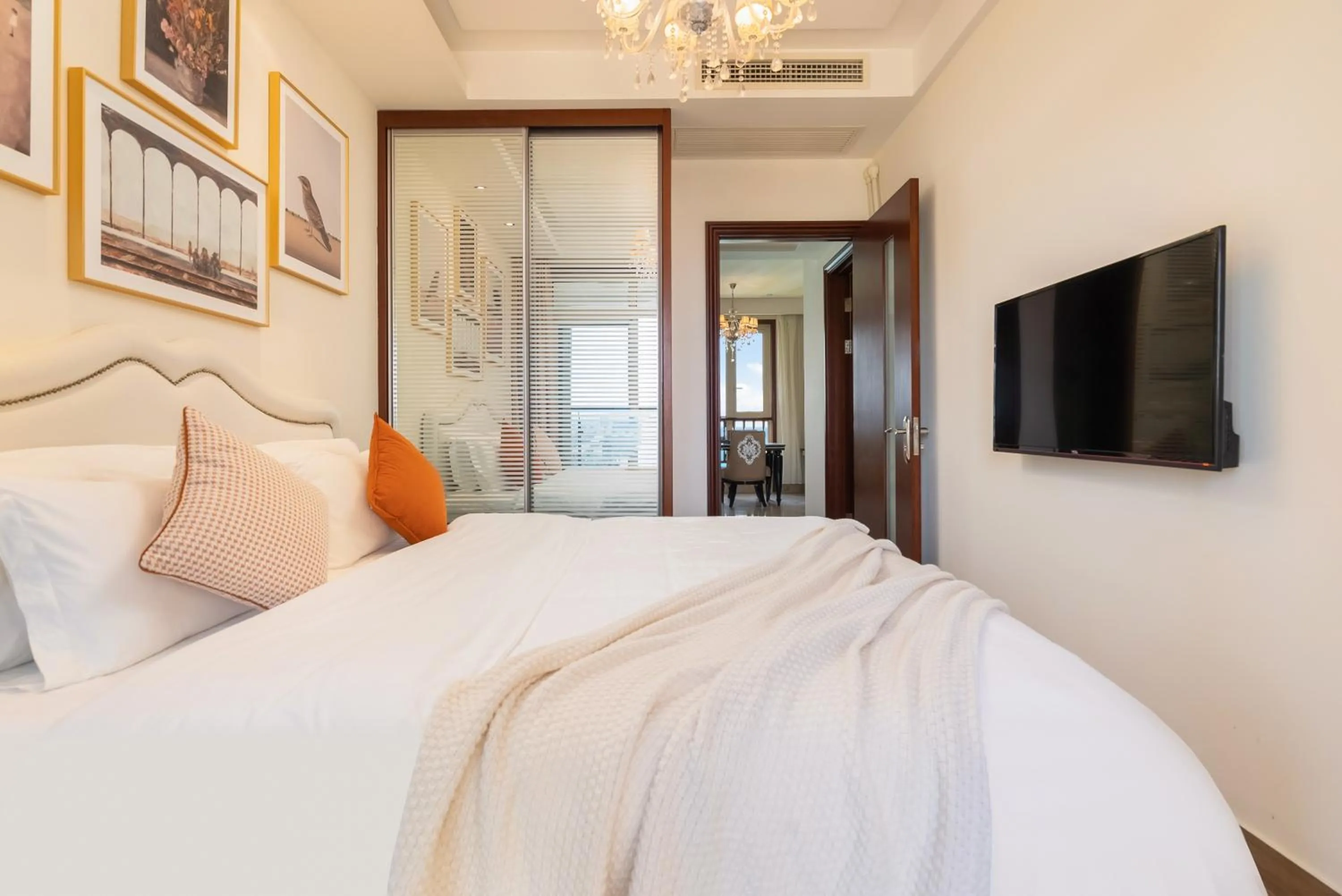 Bed in Sanya Yikehai View Apartments