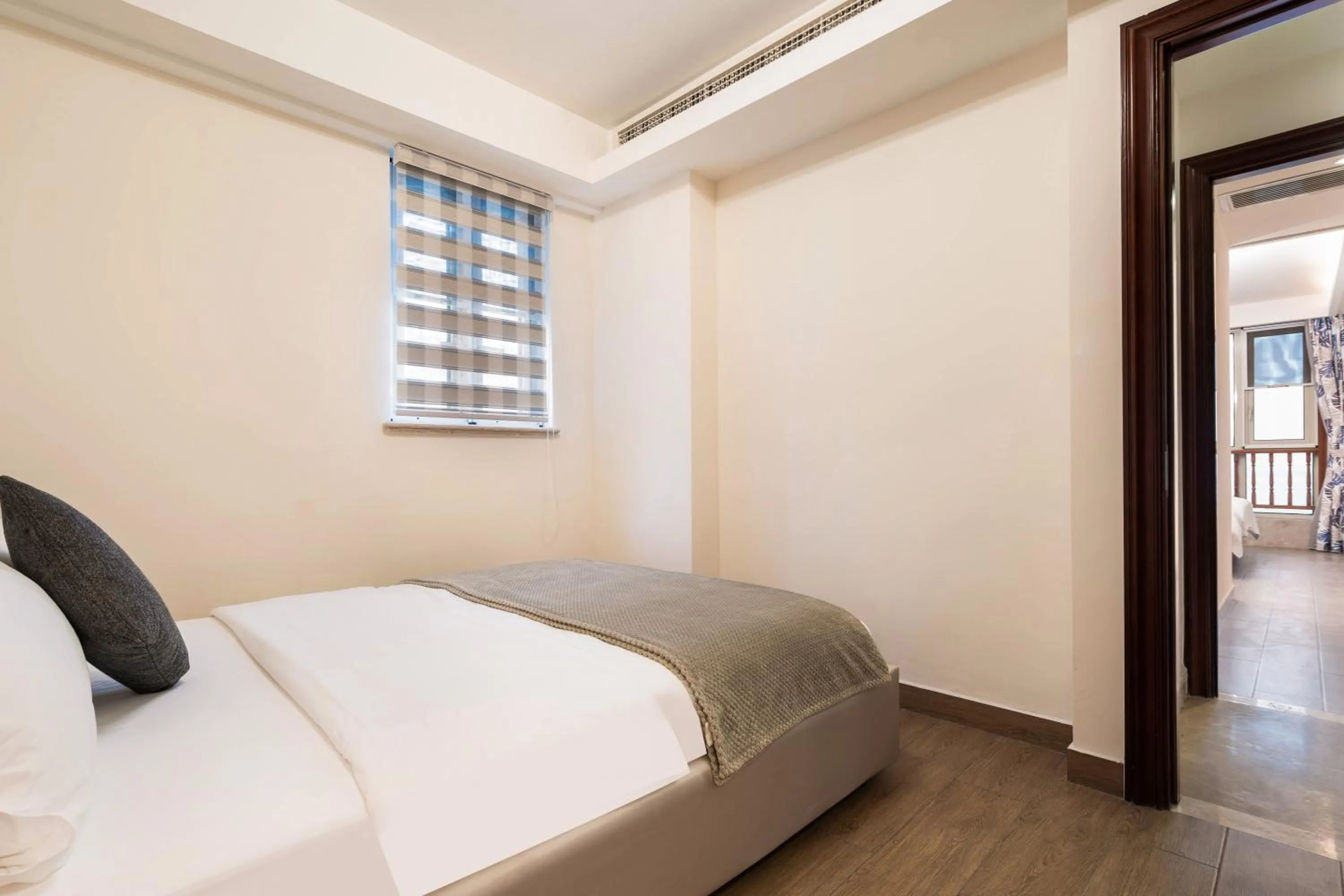 Bedroom, Bed in Sanya Yikehai View Apartments