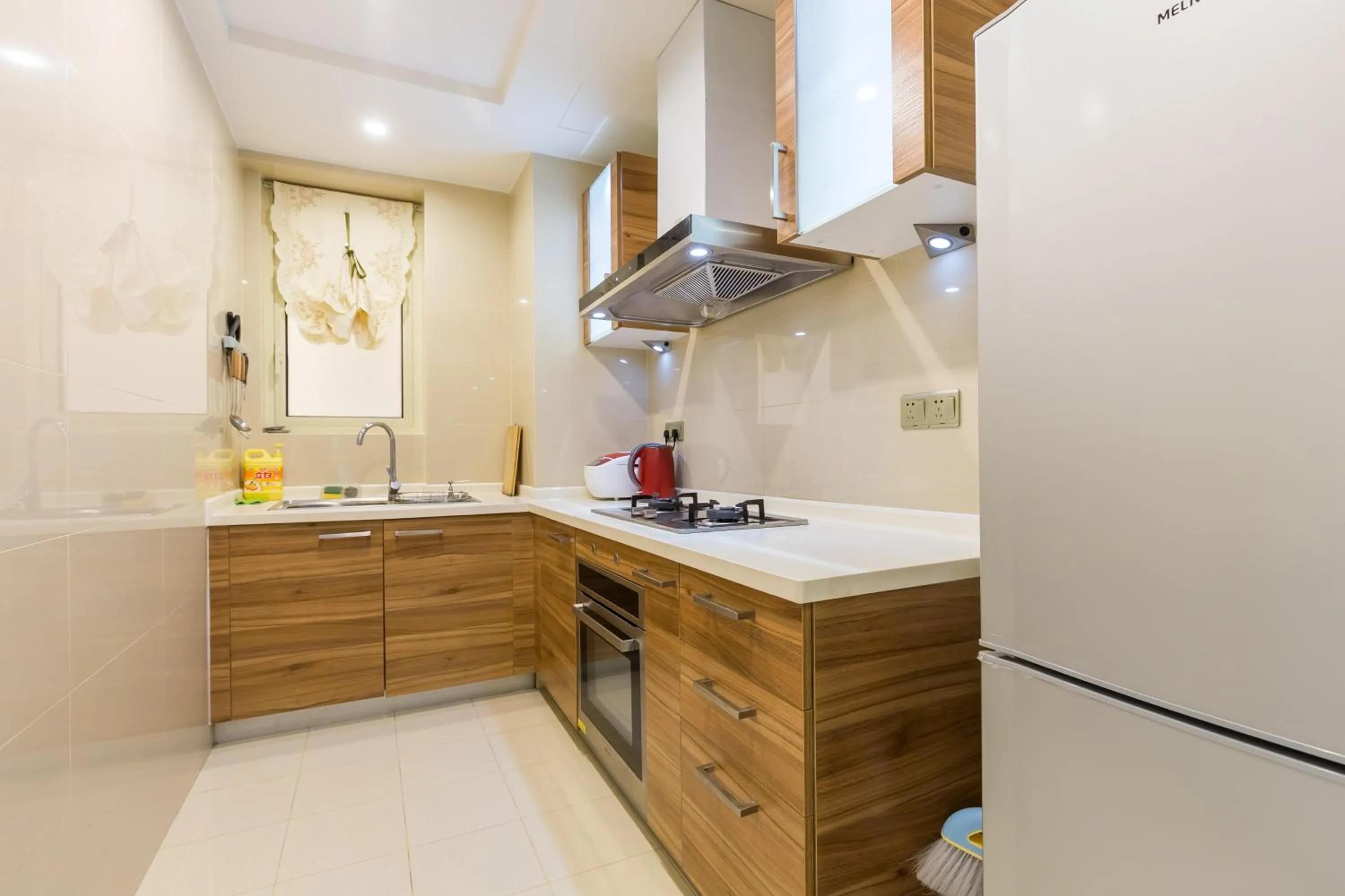Kitchen or kitchenette in Sanya Yikehai View Apartments