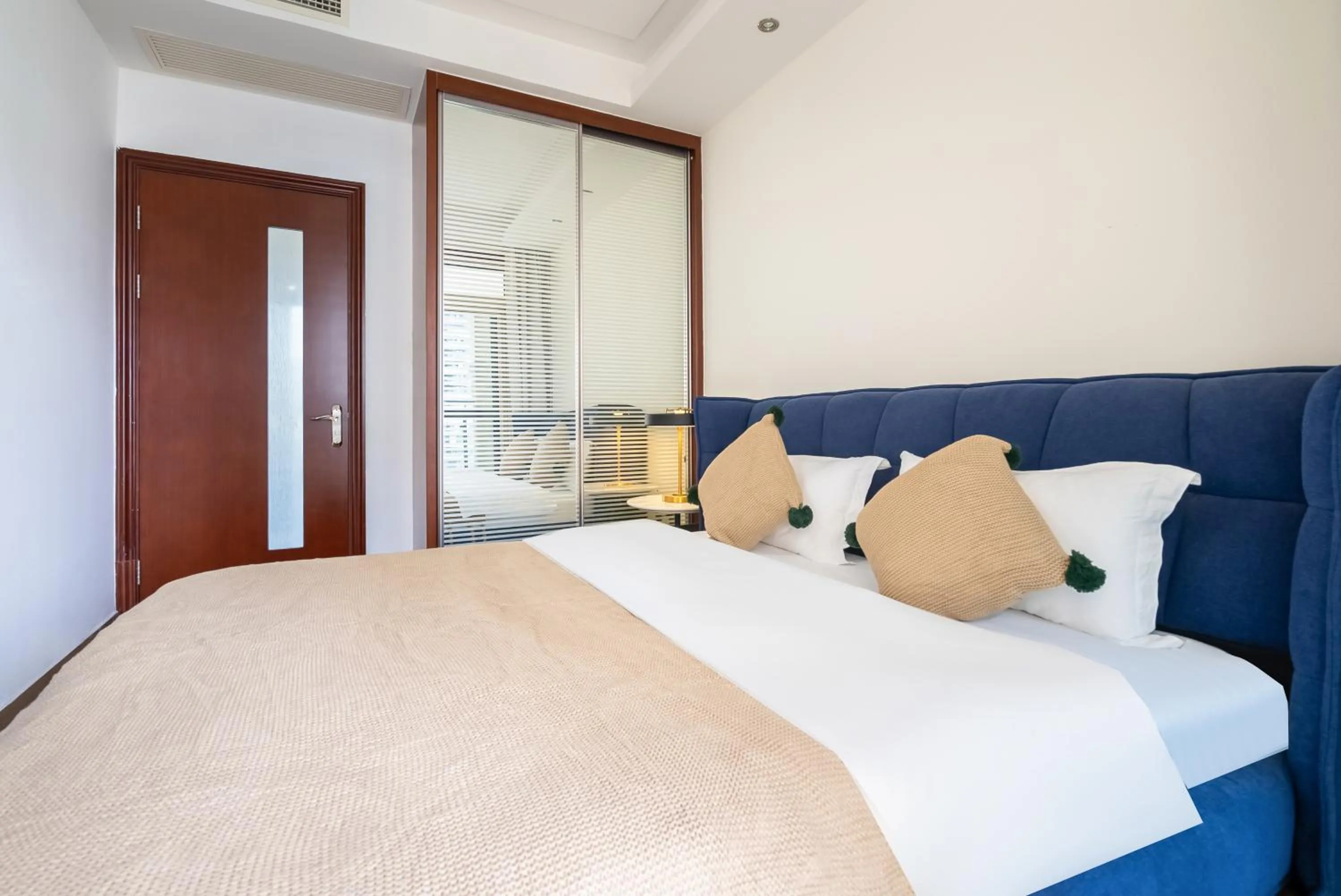 Bed in Sanya Yikehai View Apartments