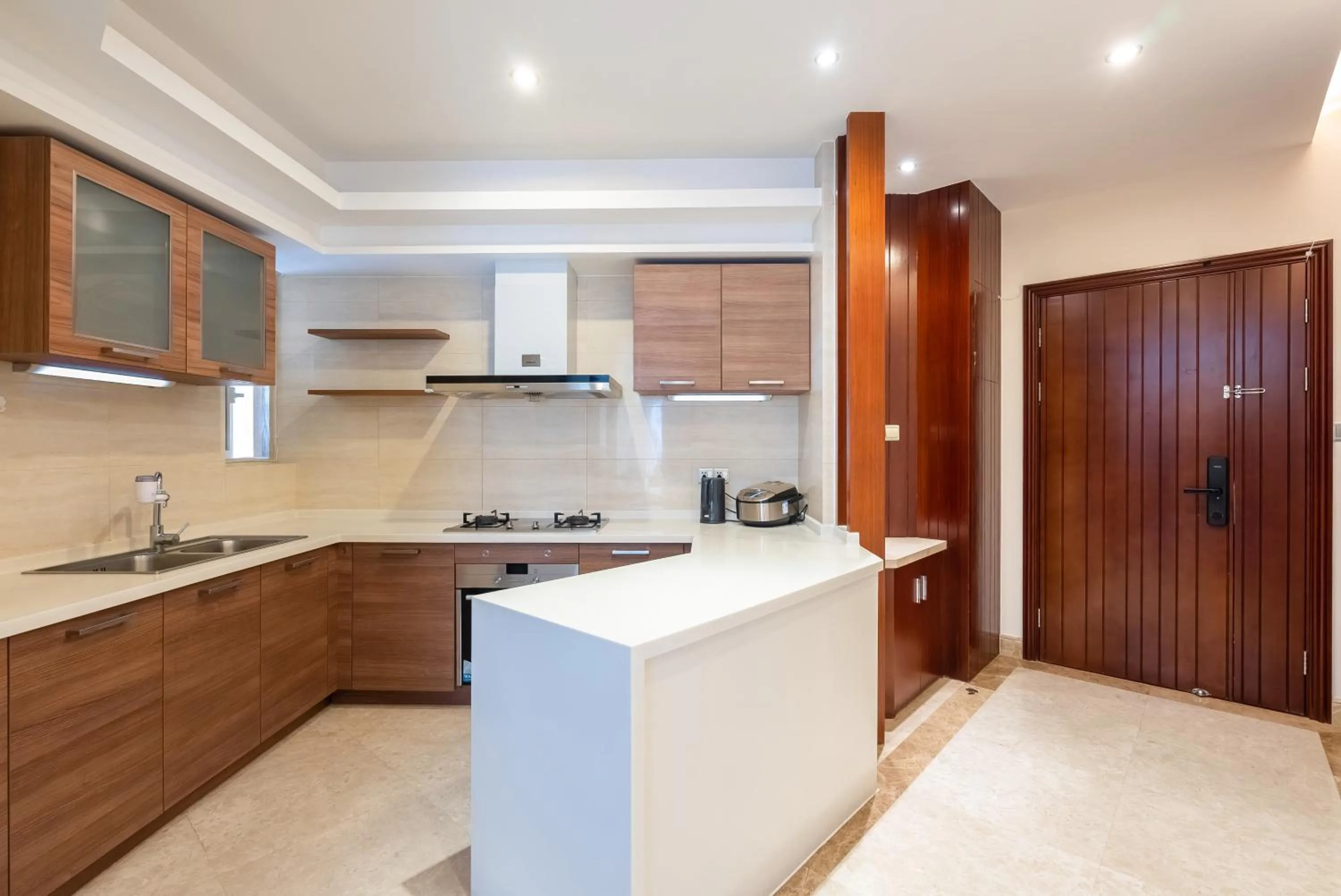 Kitchen or kitchenette in Sanya Yikehai View Apartments