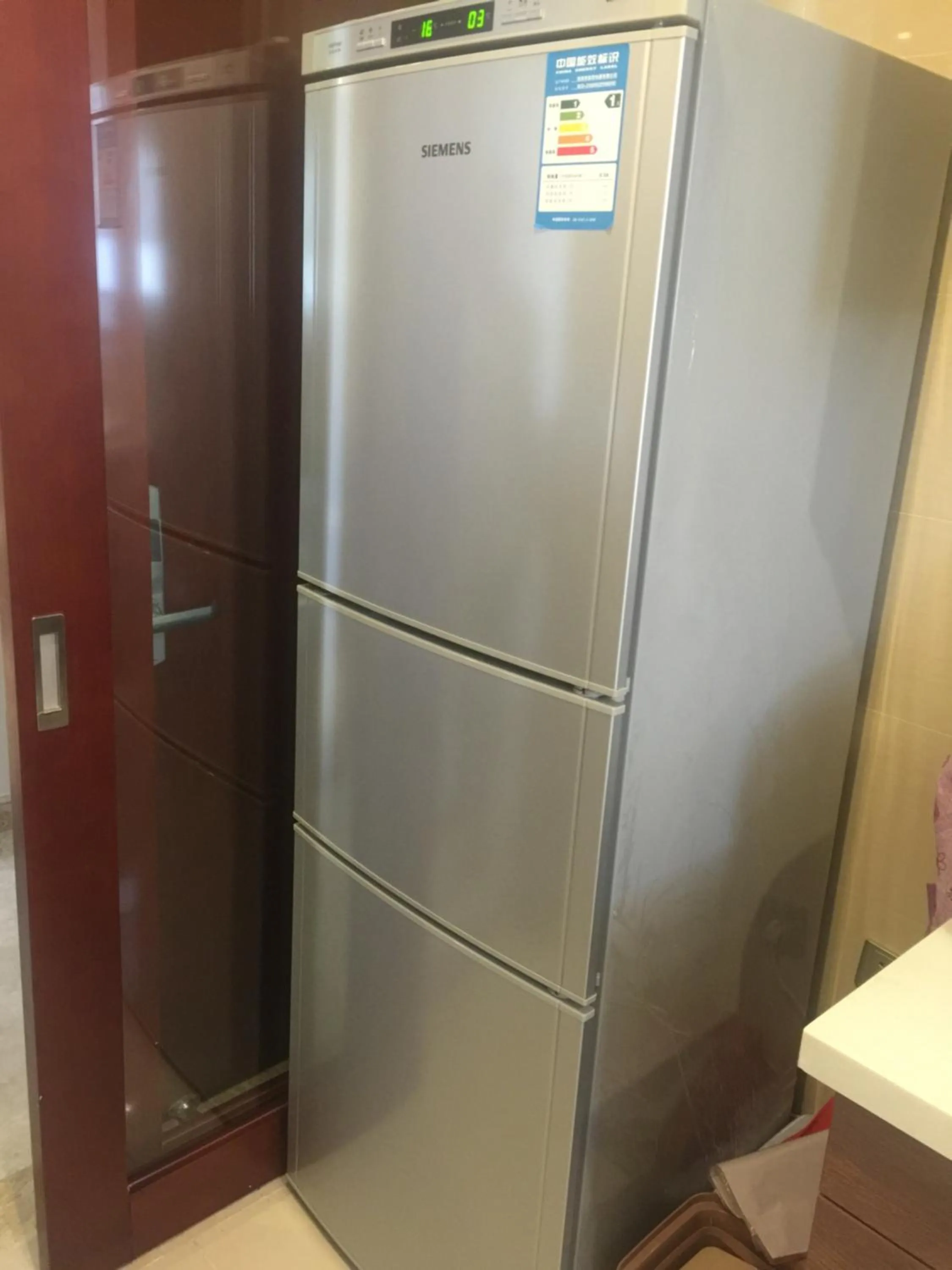 Kitchen or kitchenette in Sanya Yikehai View Apartments