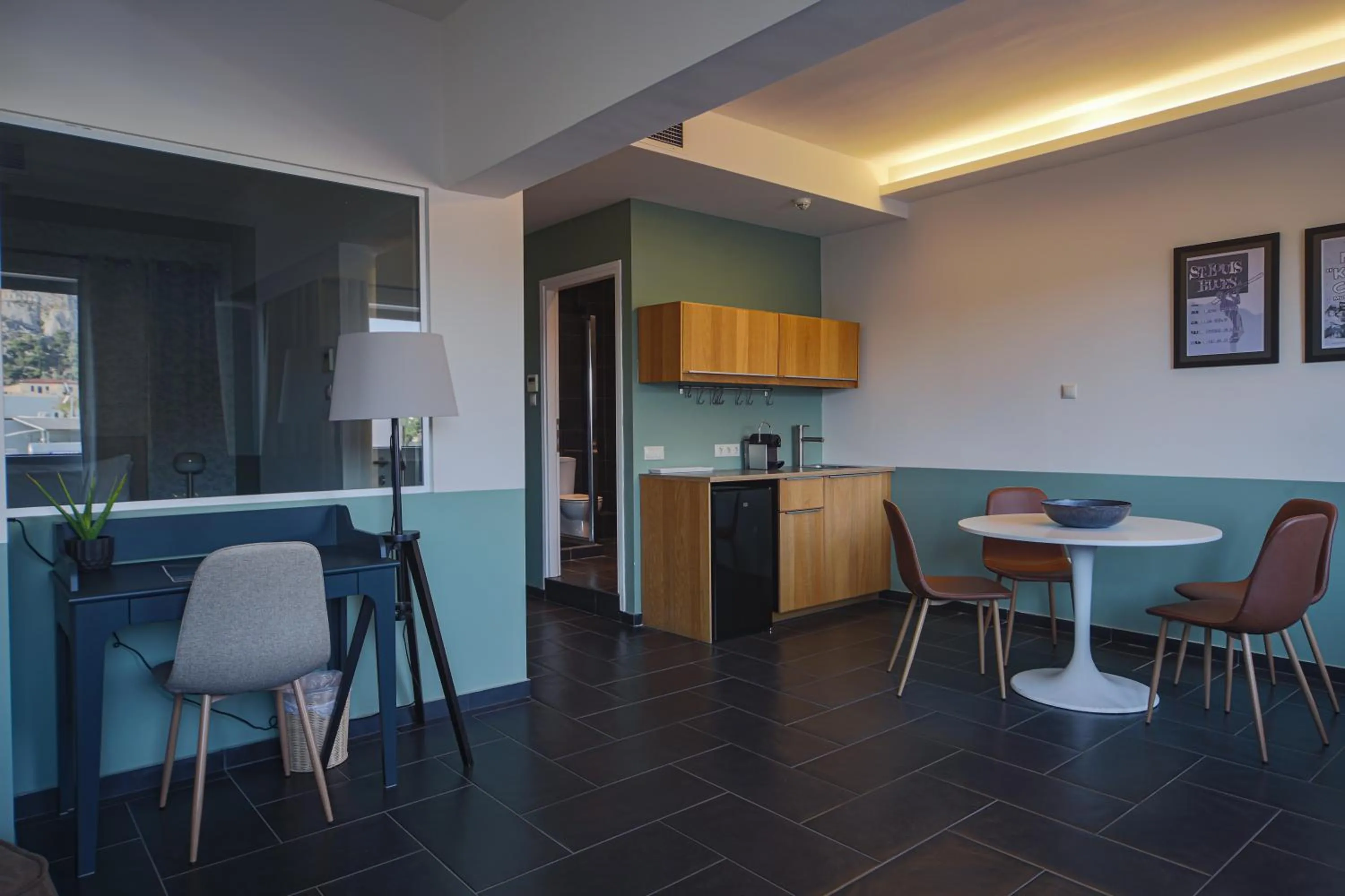 Kitchen or kitchenette in Elite Ermou Suites