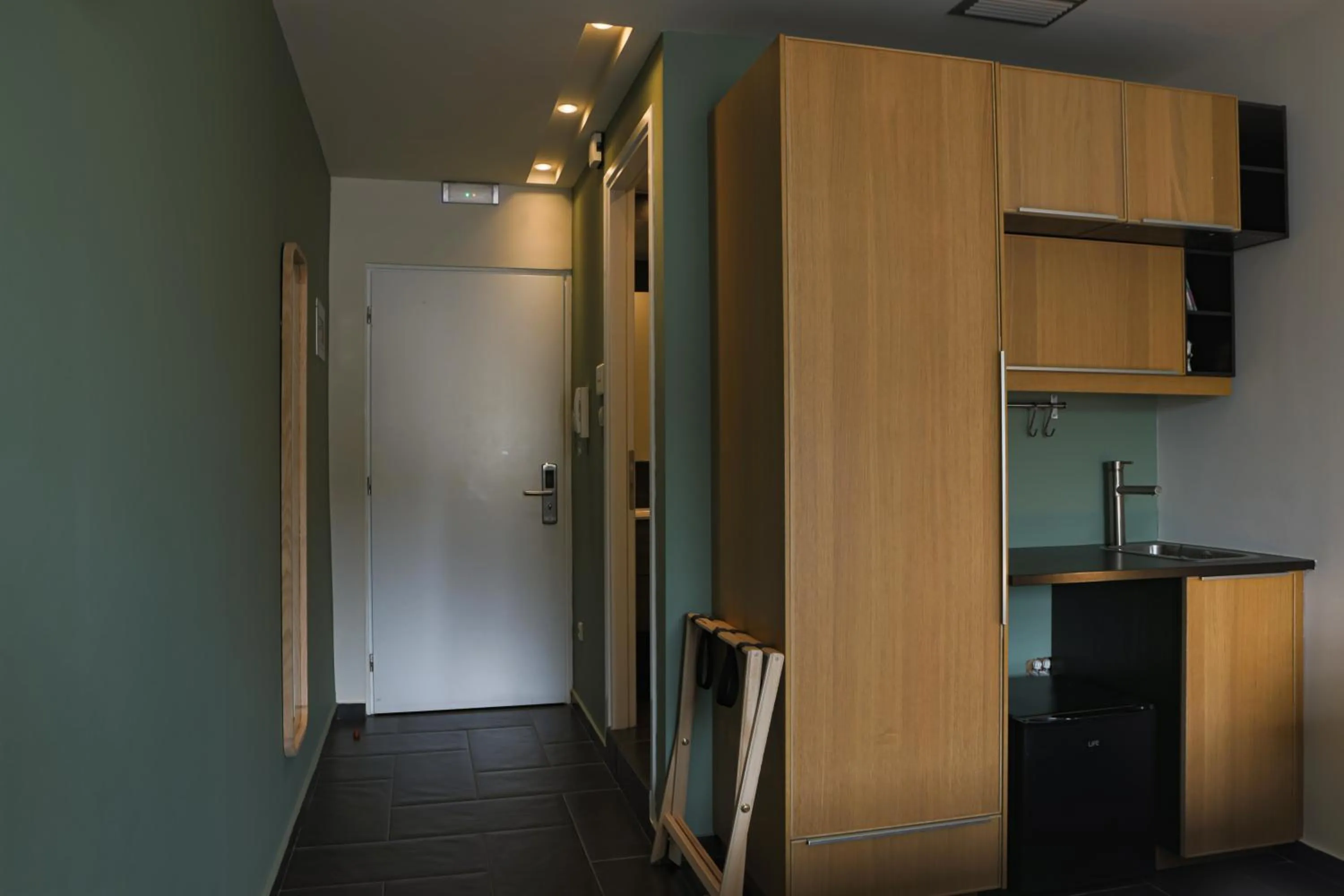 Kitchen or kitchenette in Elite Ermou Suites