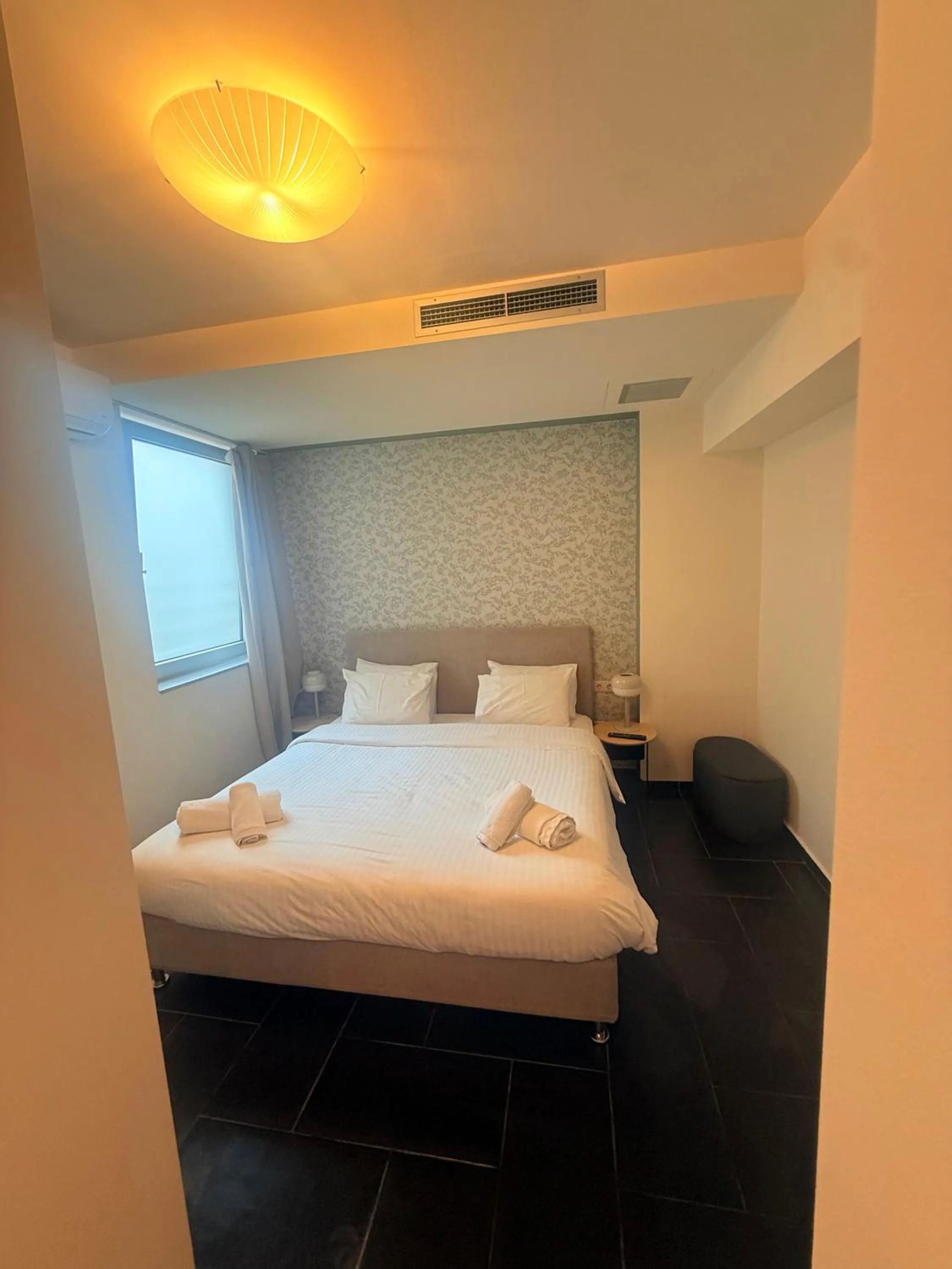 Bed in Elite Ermou Suites