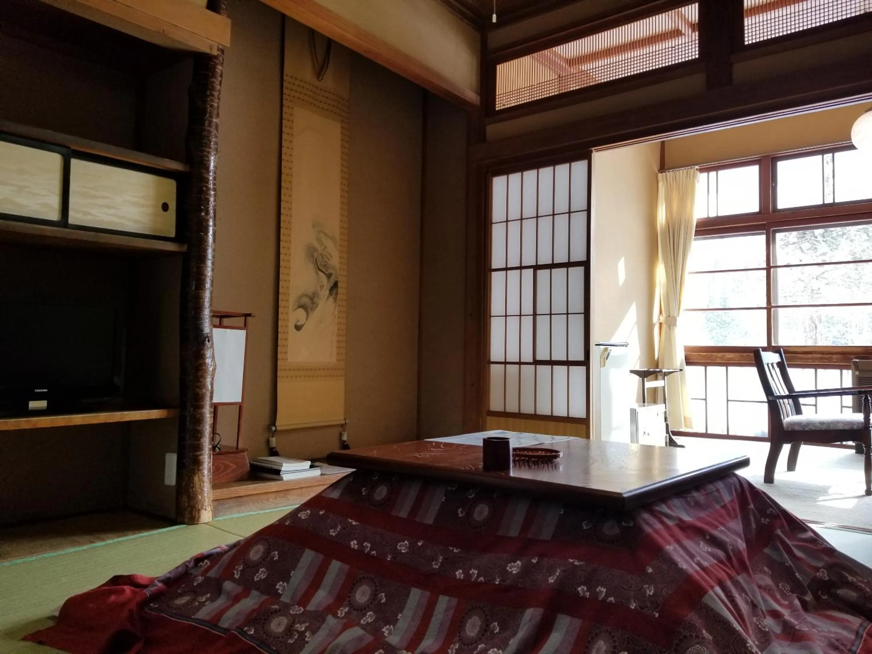 Photo of the whole room, Bed in Ryounkaku Matsunoyama onsen