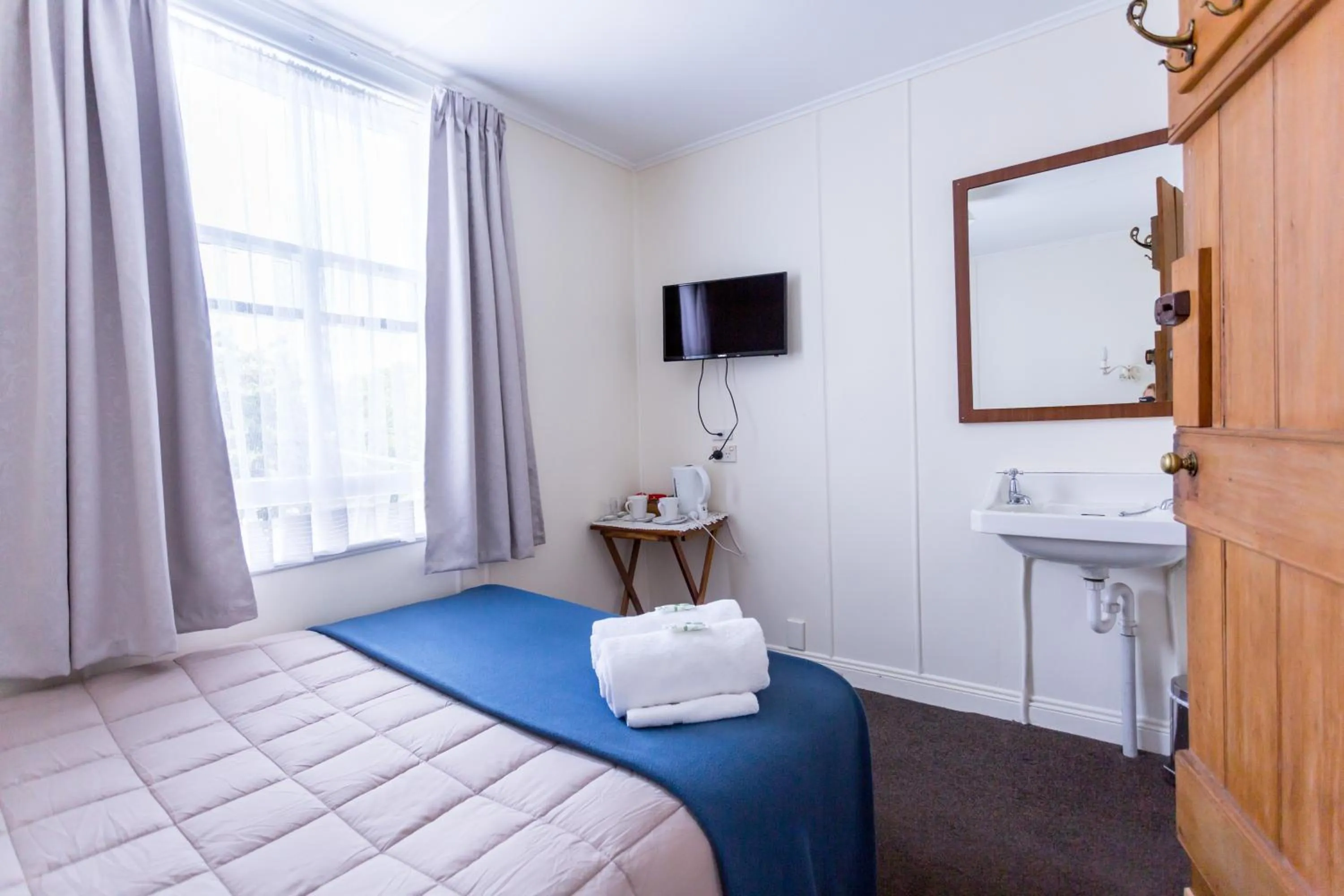 Bed in The Greytown Hotel