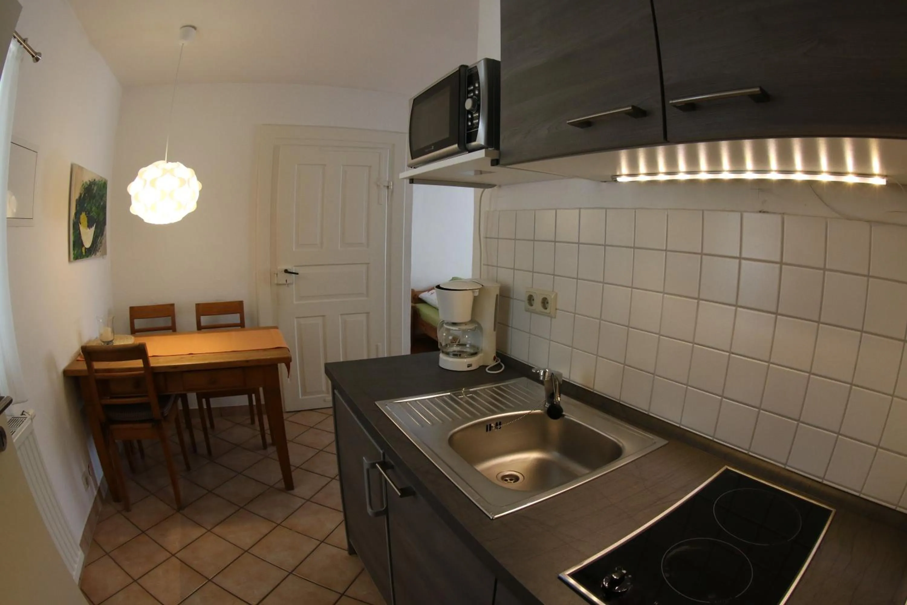 Kitchen or kitchenette in Alter Winzerhof Weisenheim am Berg e.K.