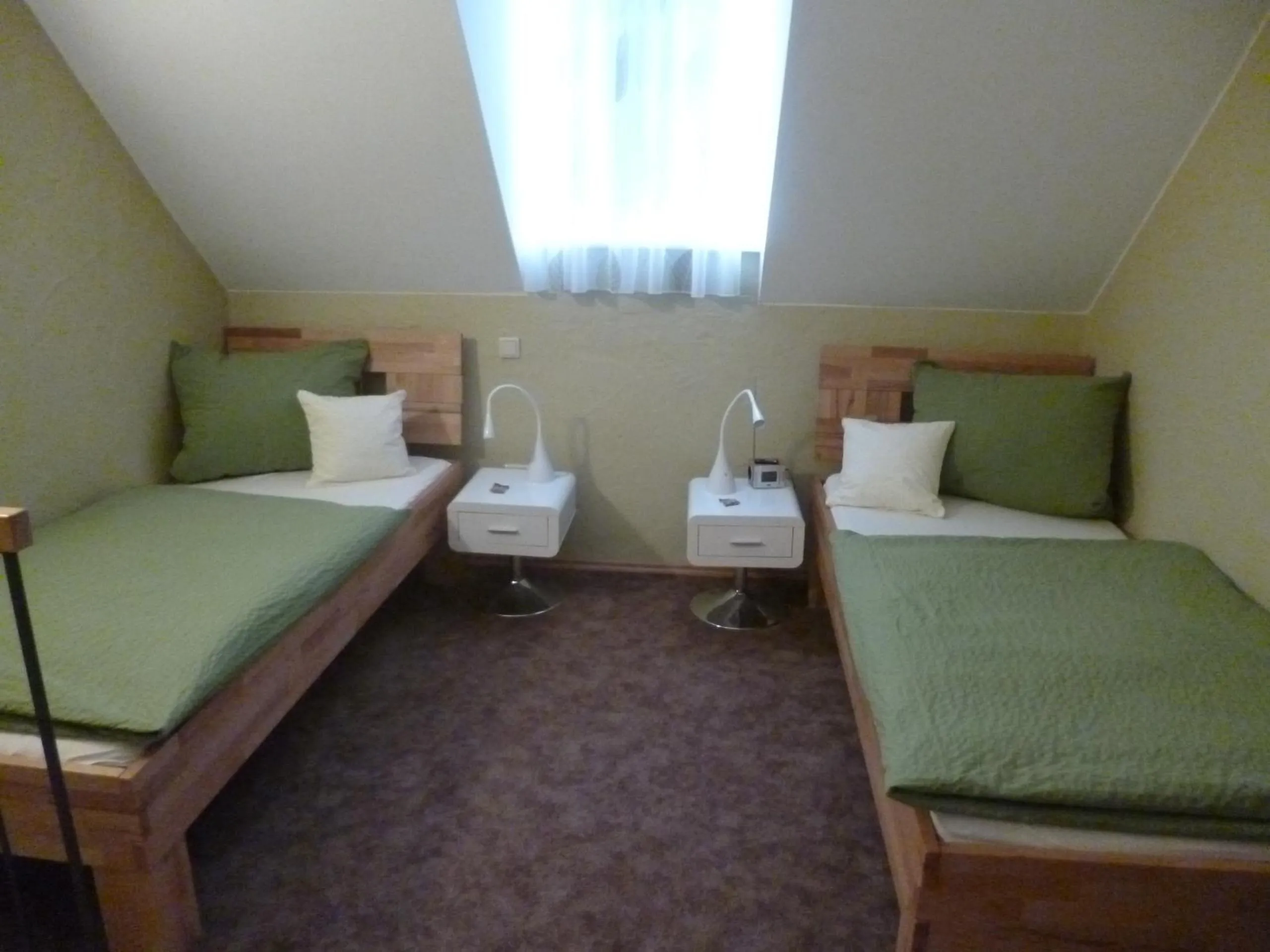 Photo of the whole room, Bed in Alter Winzerhof Weisenheim am Berg e.K.