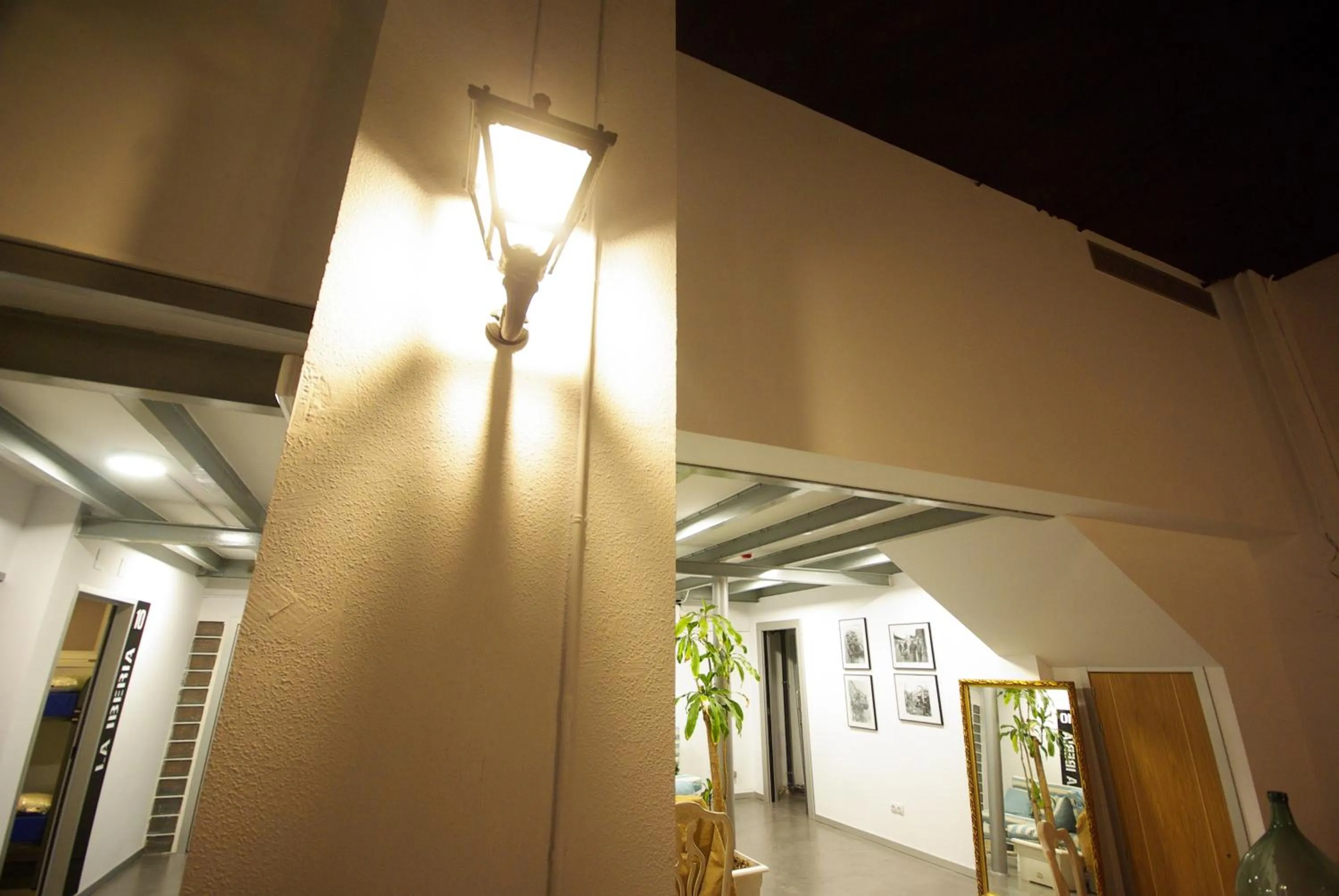 Communal lounge/ TV room in All Iron Hostel