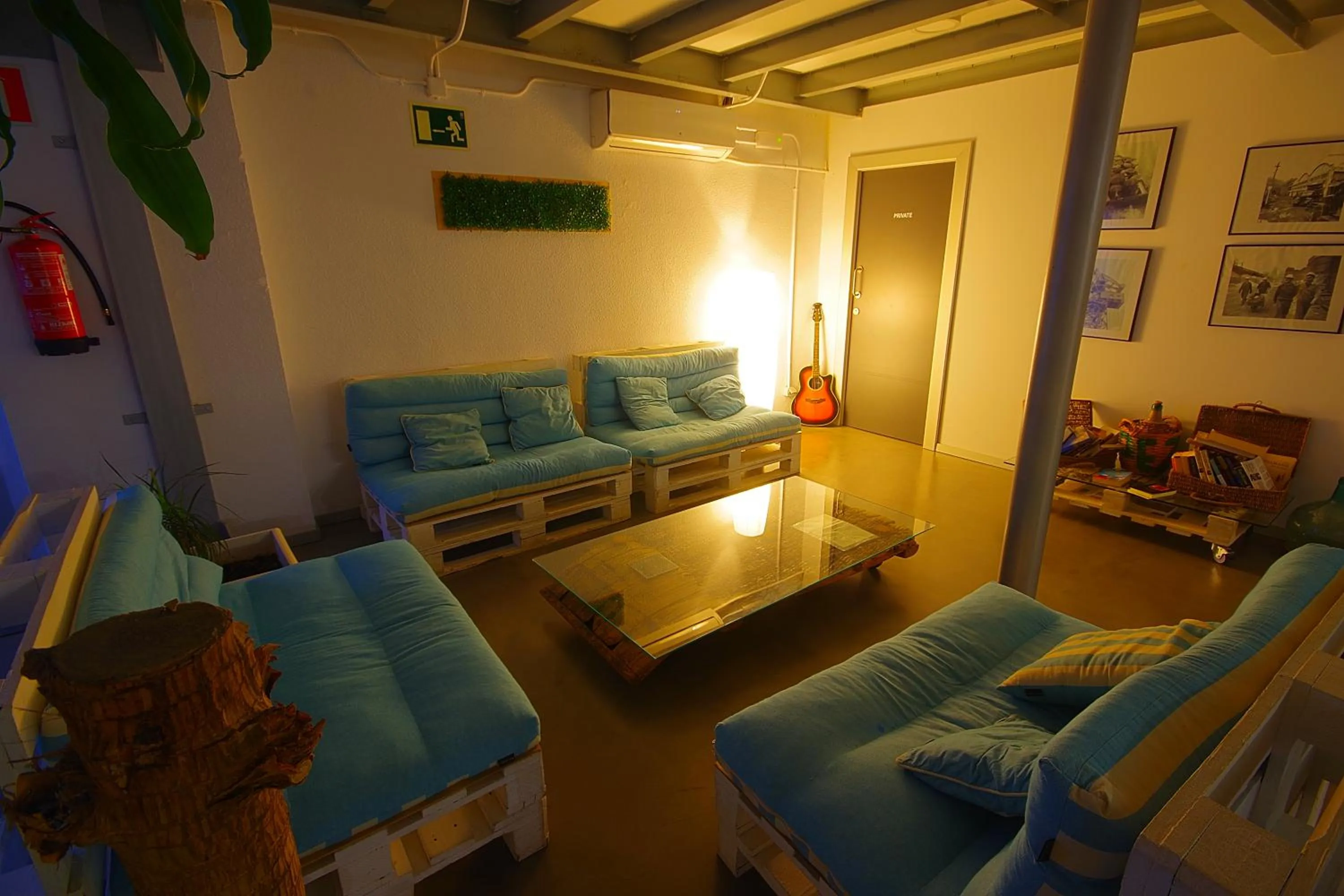 Living room, Bed in All Iron Hostel