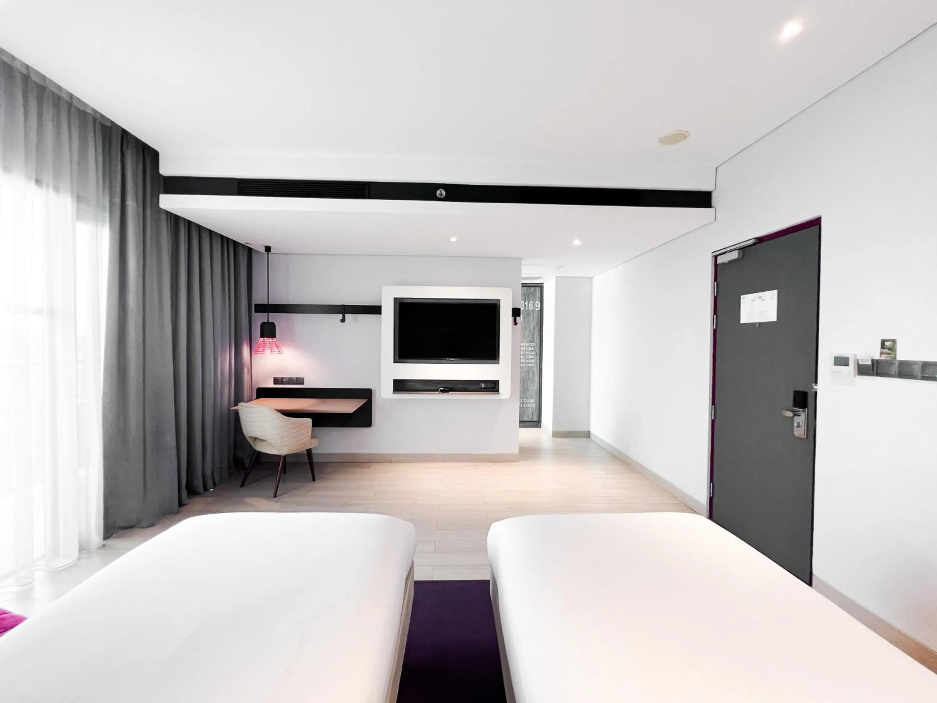Communal lounge/ TV room, Bed in ibis Styles Batam Nagoya