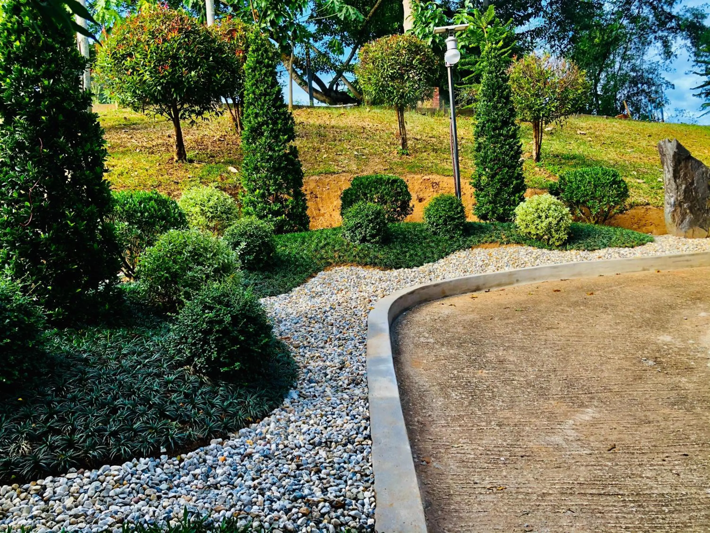 Garden in Chiangkhong Teak Garden Riverfront Onsen Hotel- SHA Extra Plus