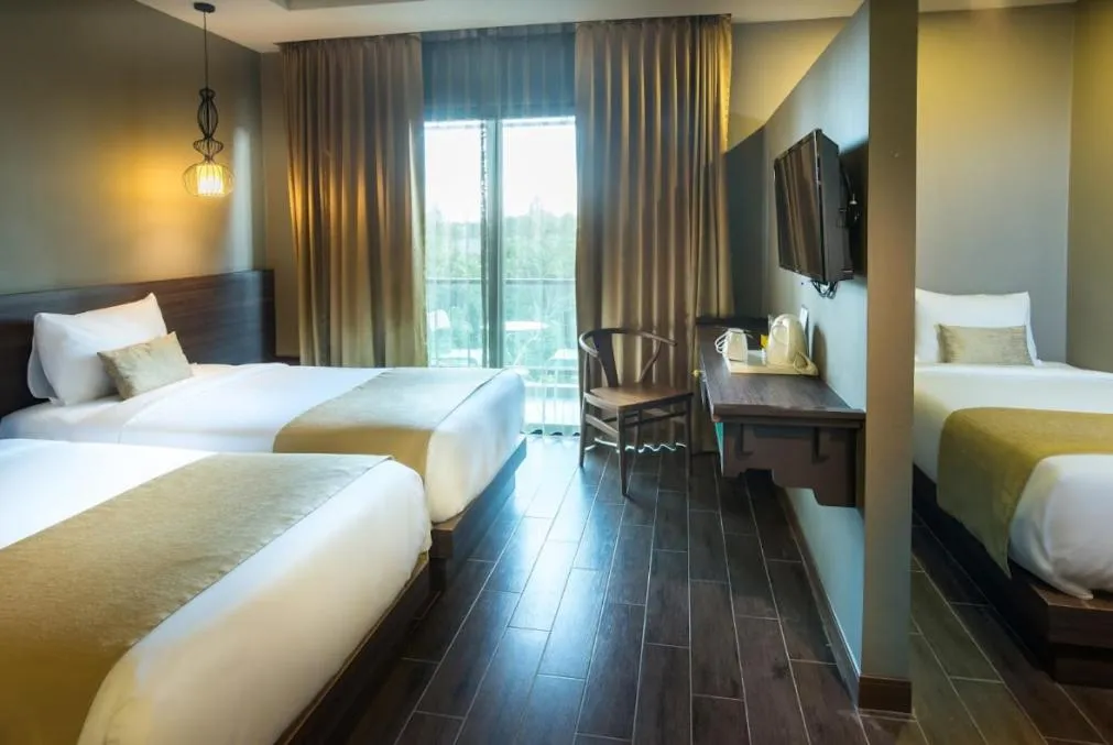 Bedroom, Bed in Chiangkhong Teak Garden Riverfront Onsen Hotel- SHA Extra Plus