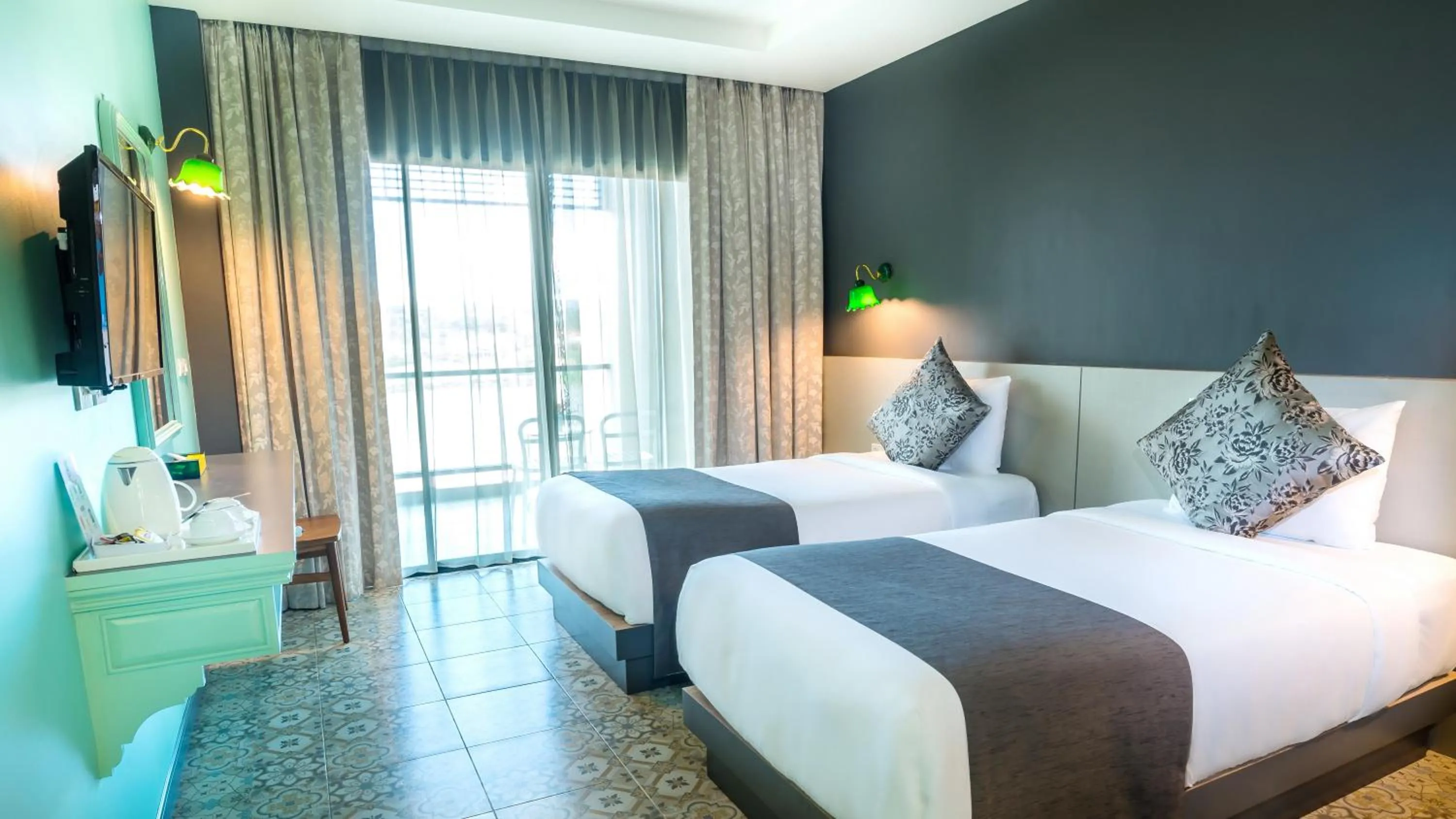 Bed in Chiangkhong Teak Garden Riverfront Onsen Hotel- SHA Extra Plus