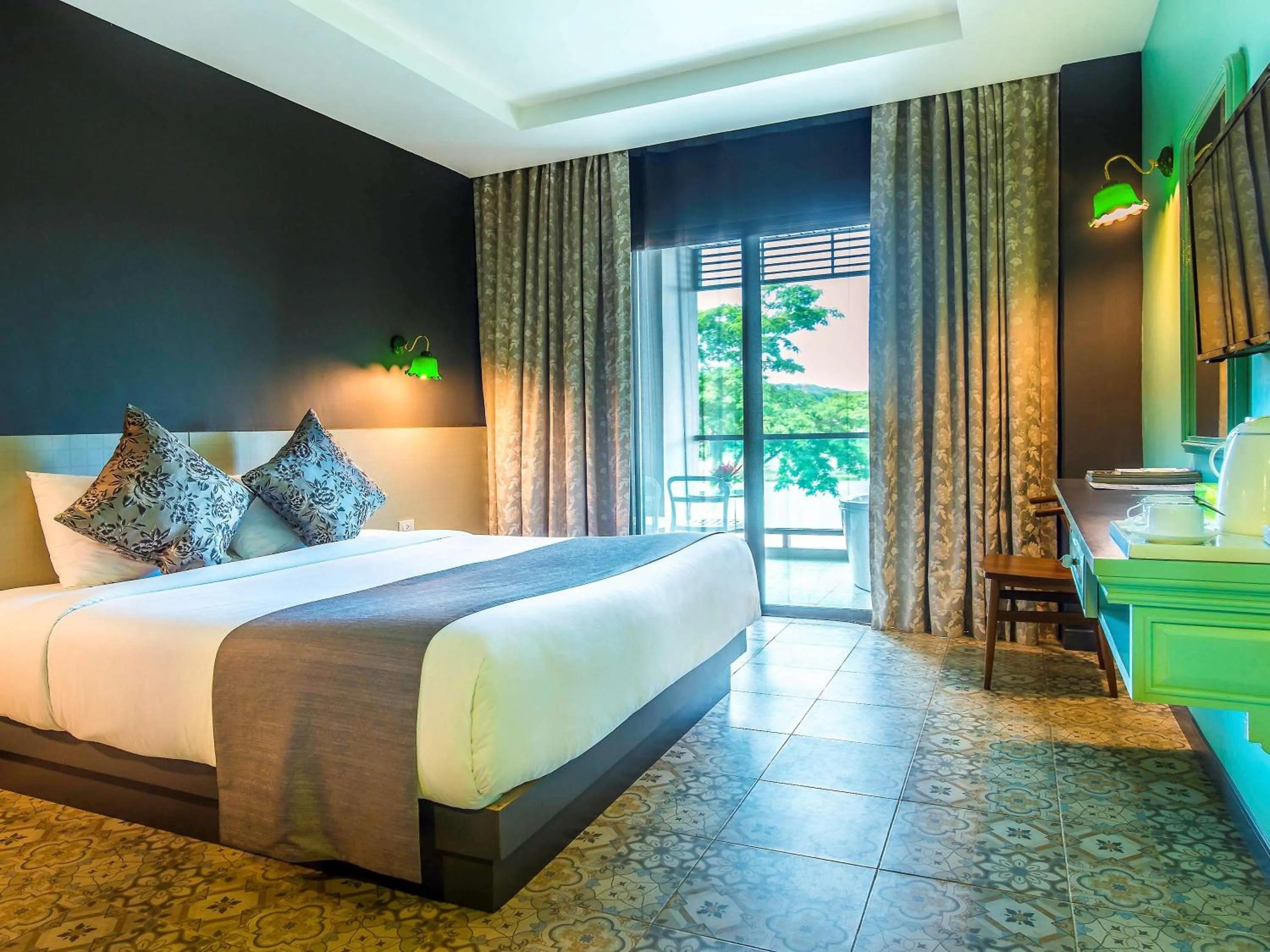 Photo of the whole room, Bed in Chiangkhong Teak Garden Riverfront Onsen Hotel- SHA Extra Plus