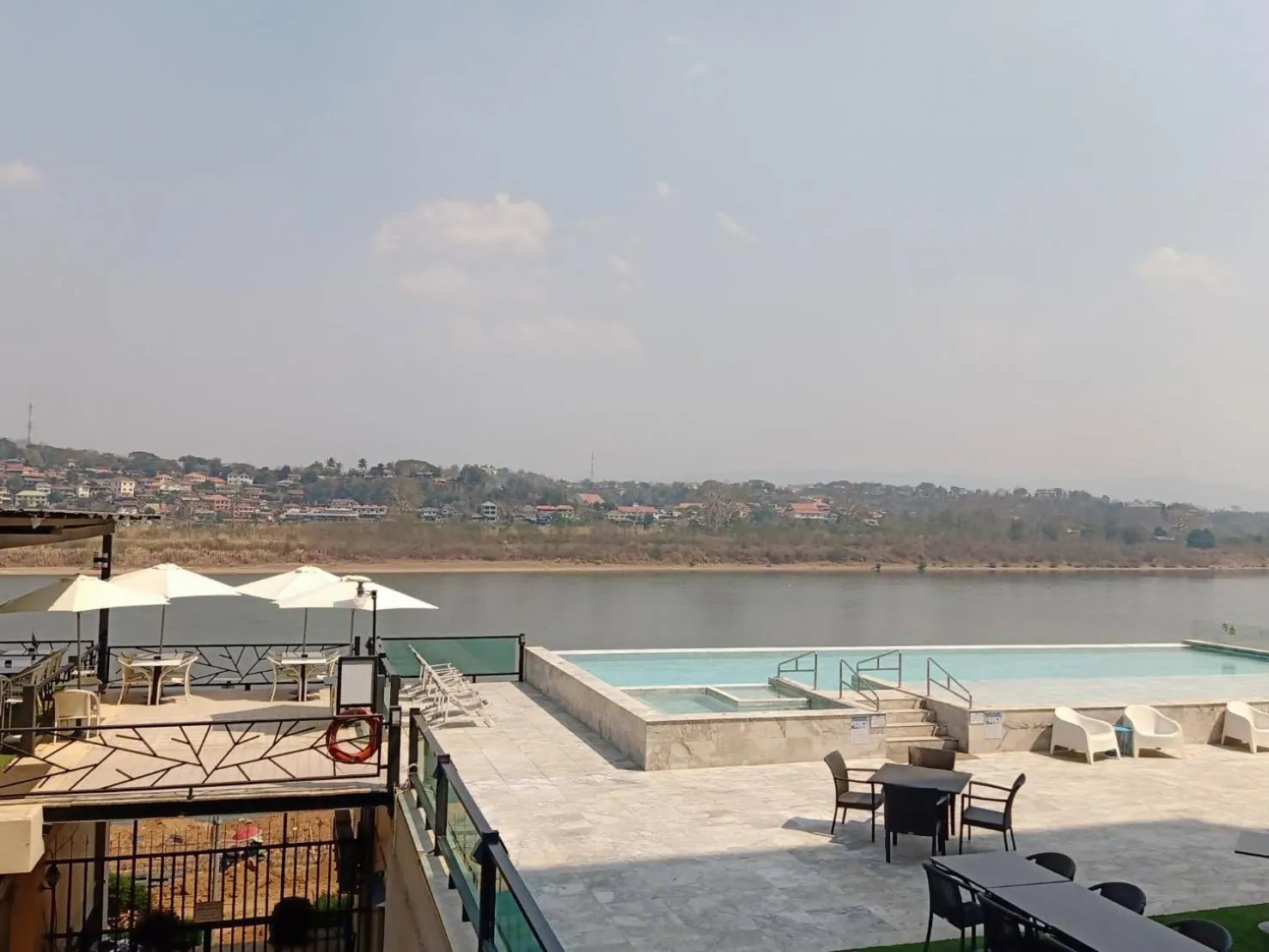 Swimming pool in Chiangkhong Teak Garden Riverfront Onsen Hotel- SHA Extra Plus