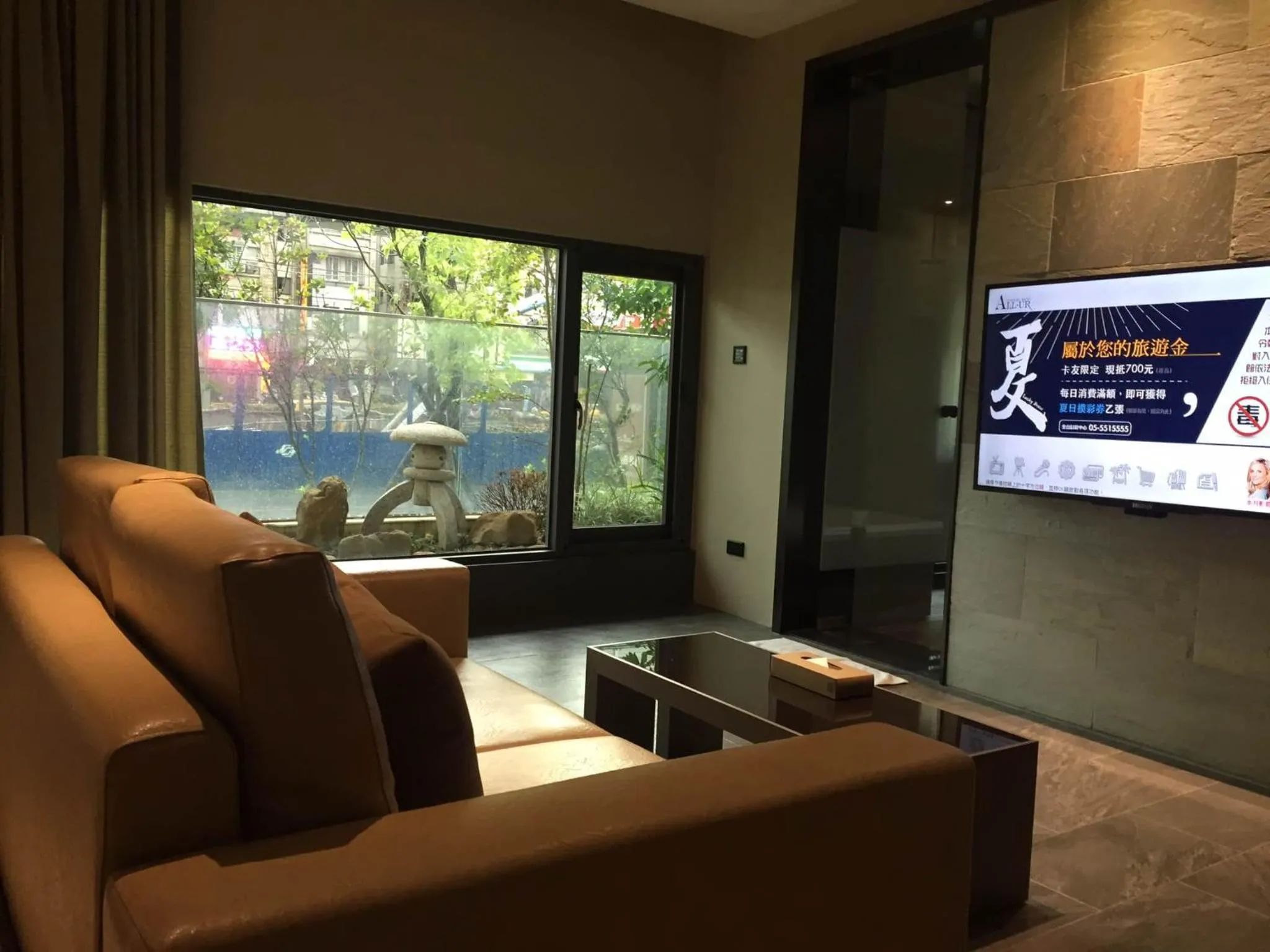 Living room in All-Ur Boutique Motel - Xinzhuang Branch