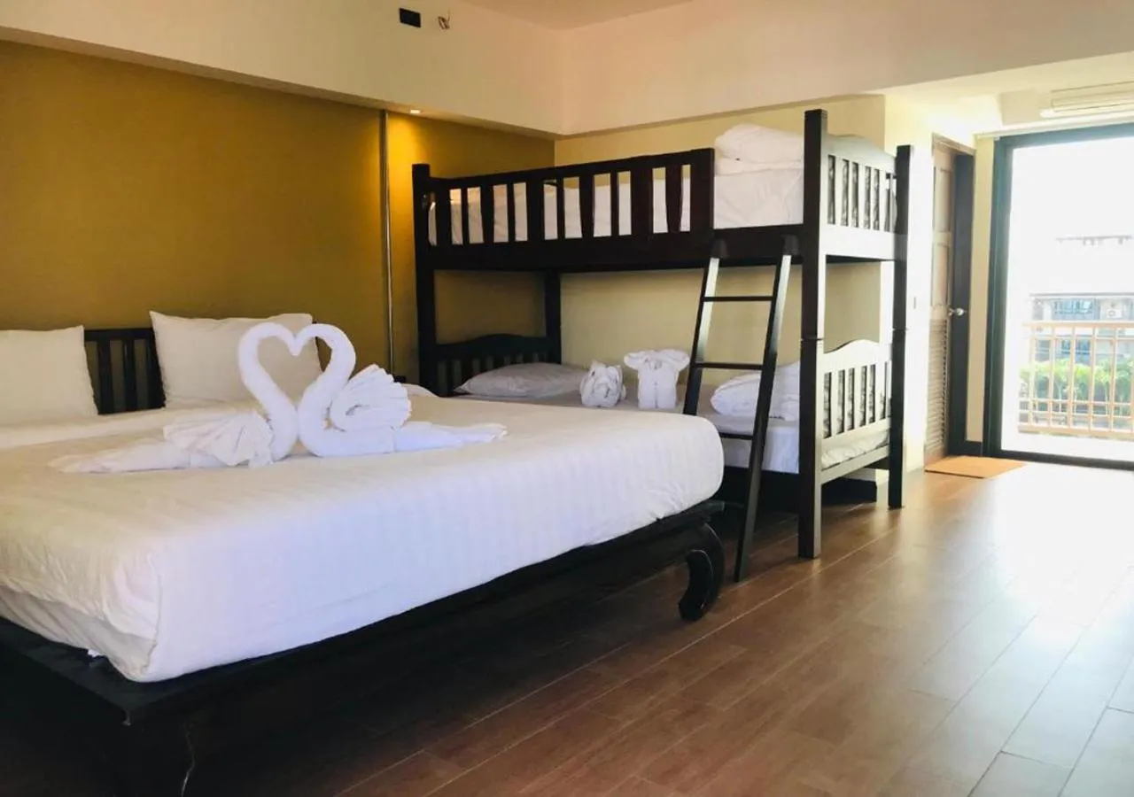 Photo of the whole room, Bed in Baan Sang Singh