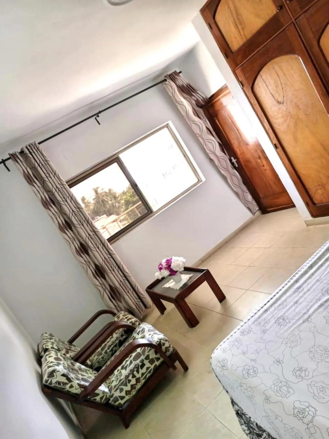 Bed in Rosalie's Suites