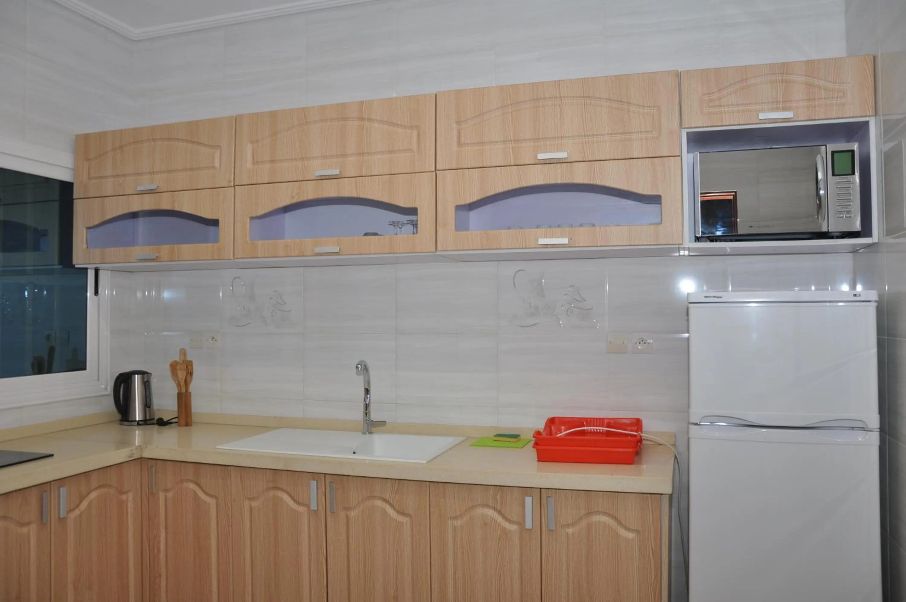 Kitchen or kitchenette in Rosalie's Suites