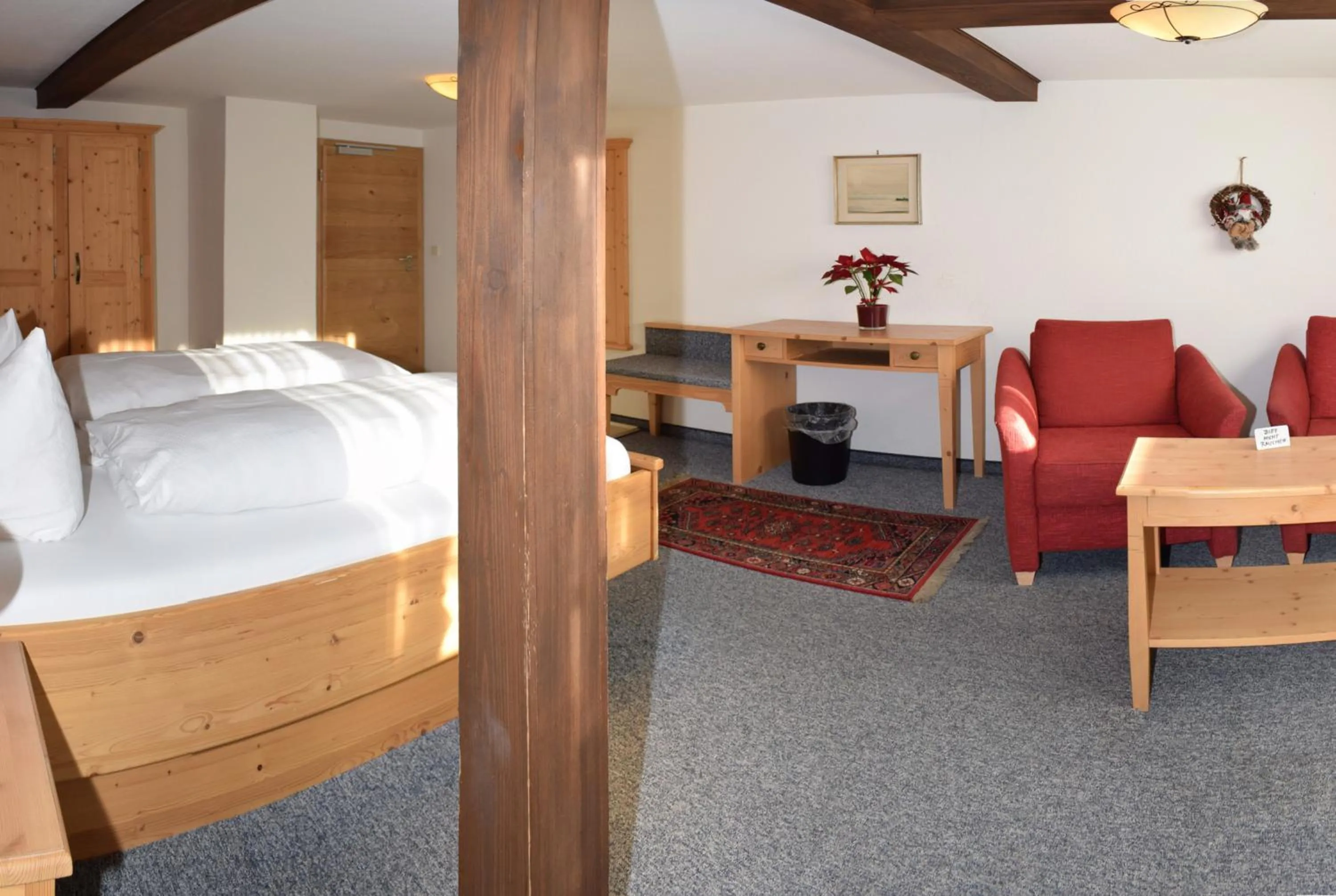 Seating area, Bed in Der Berghof