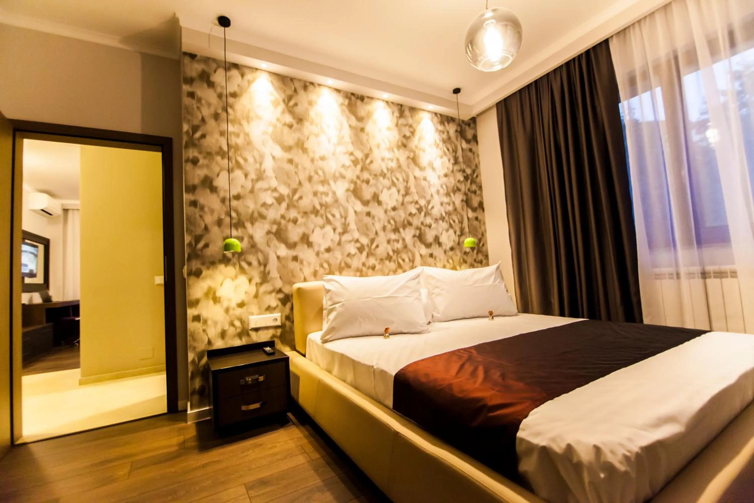 Seating area, Bed in Cluj Business Class