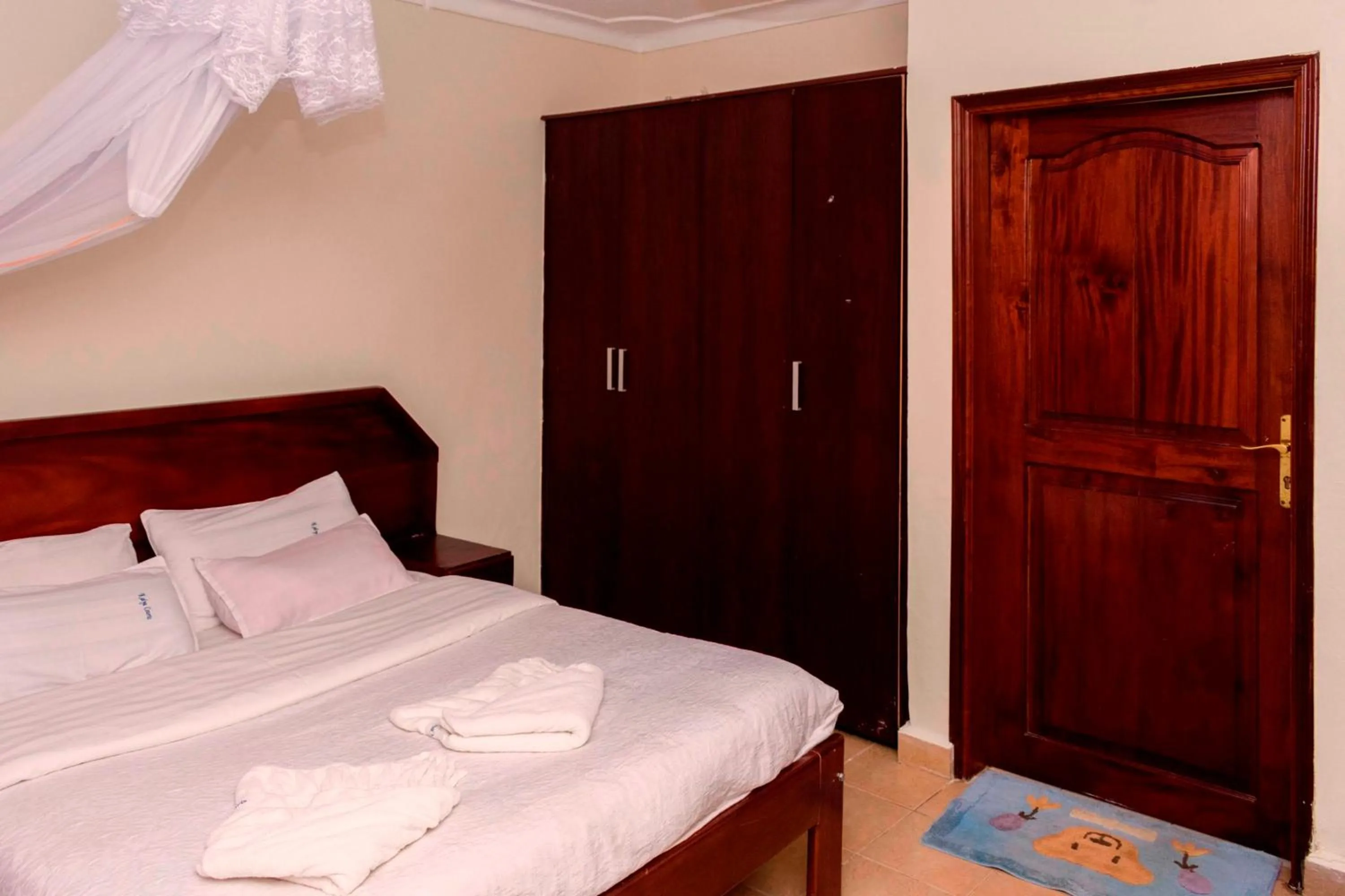 Bed in Kalya Courts Hotel Fort Portal