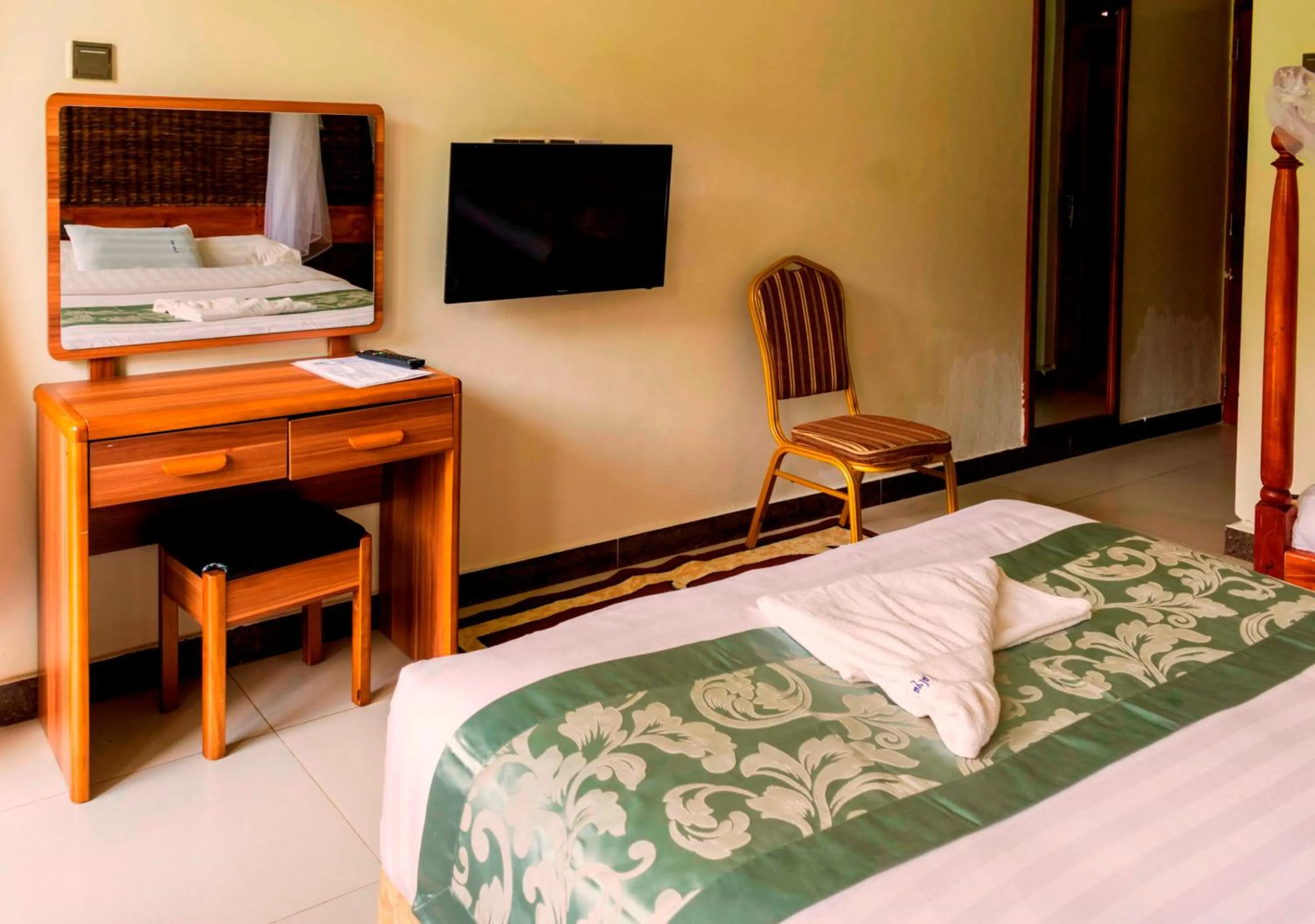 Bed in Kalya Courts Hotel Fort Portal