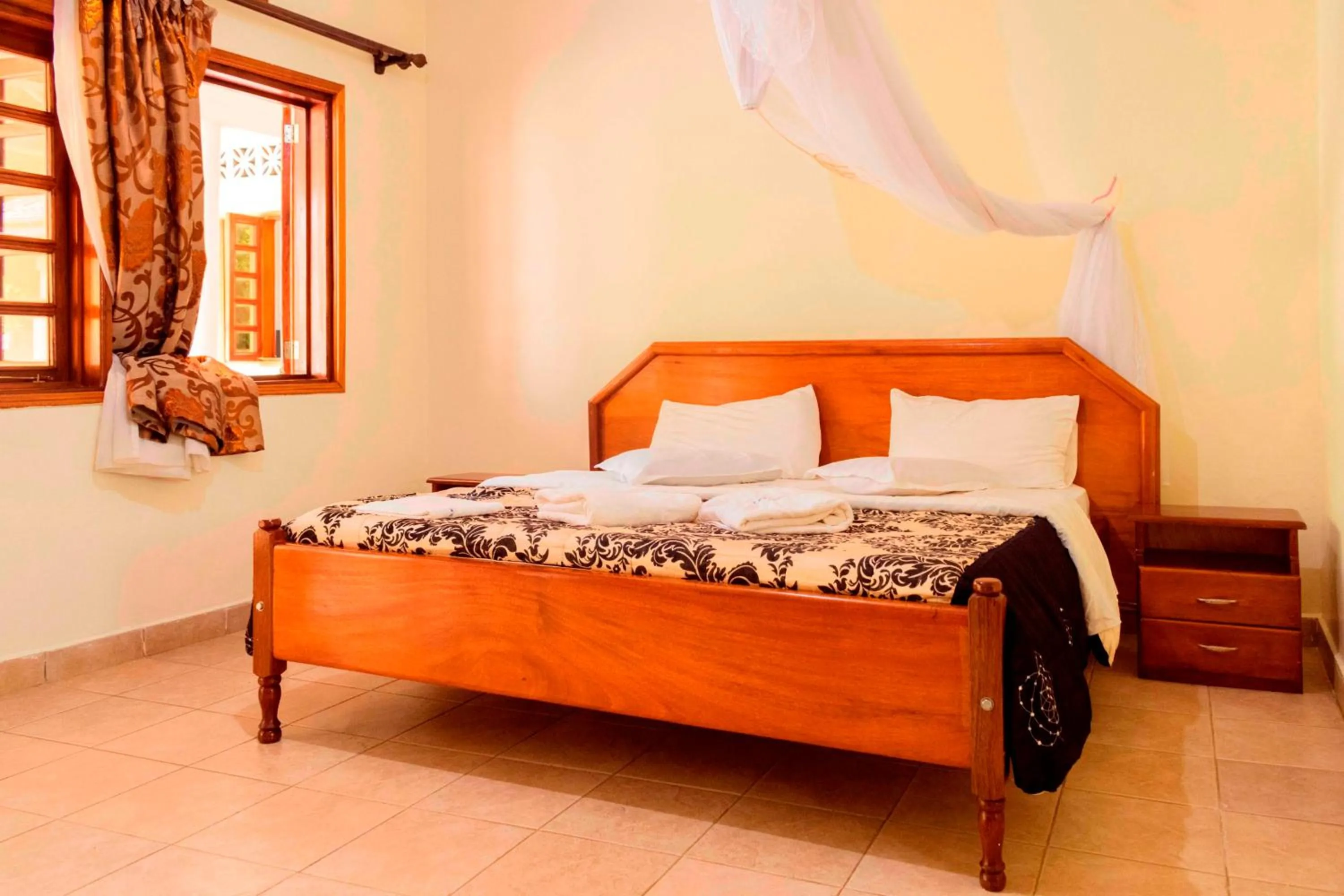 Bed in Kalya Courts Hotel Fort Portal