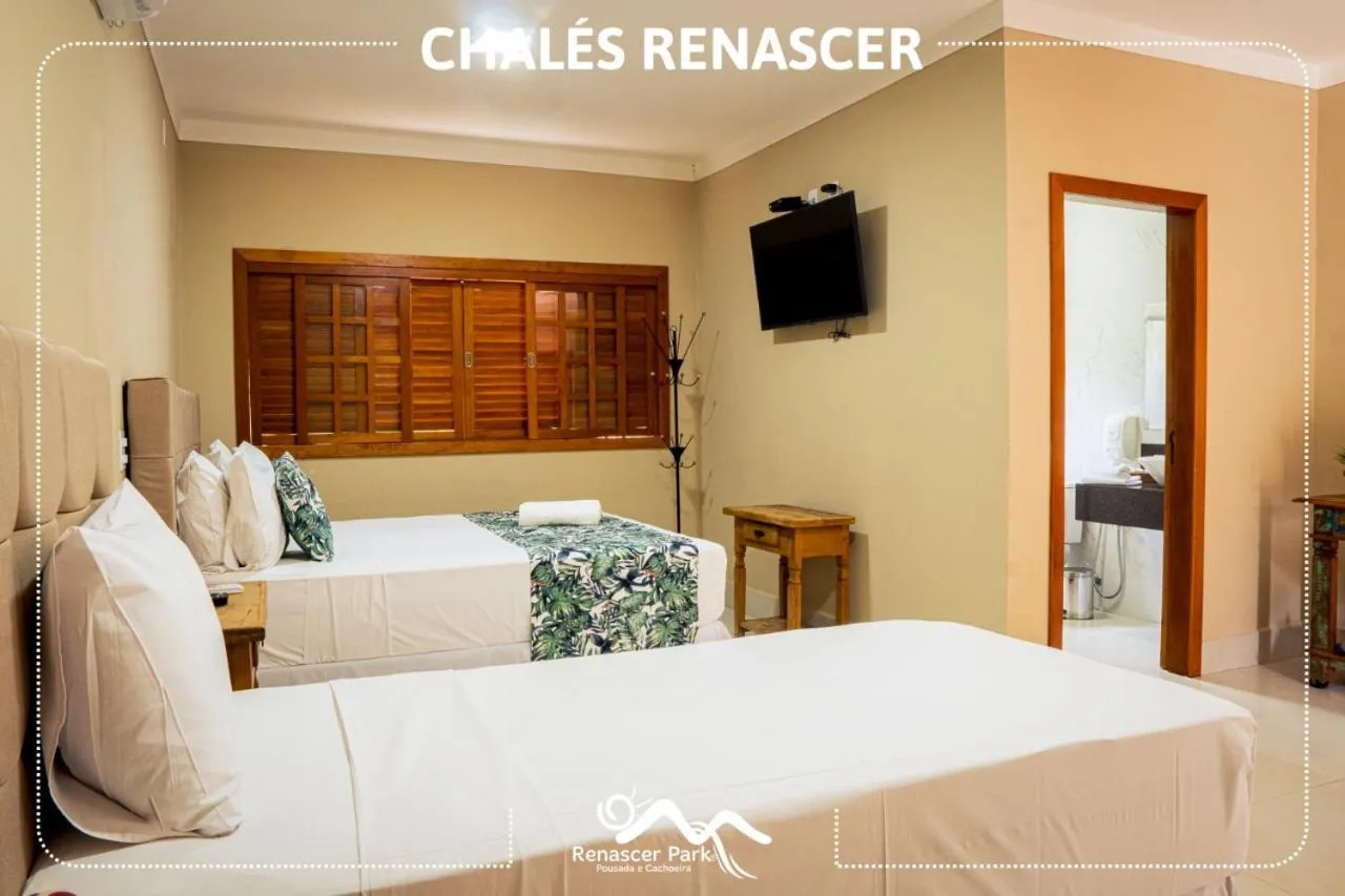 Bed in Pousada Renascer Park