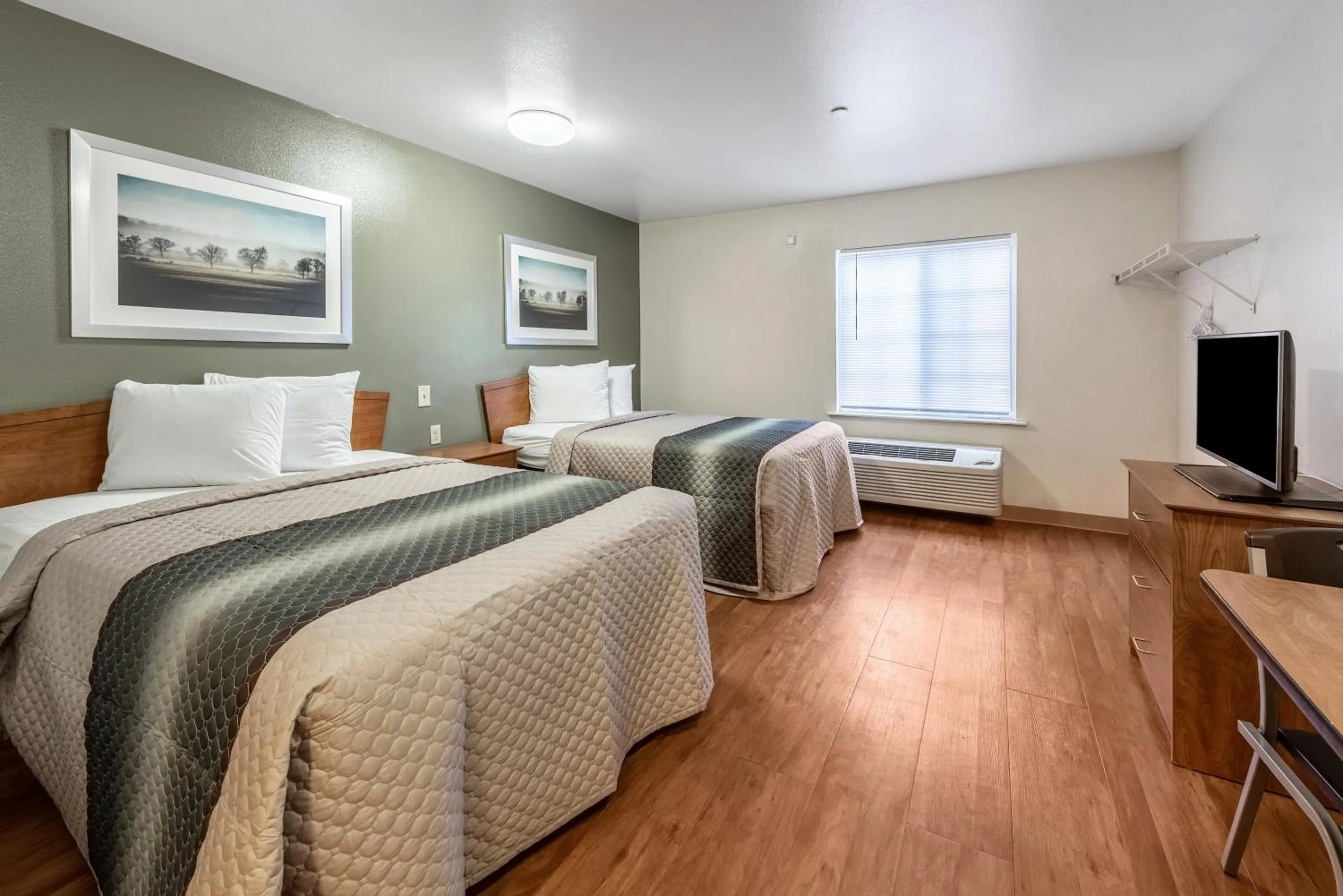 Photo of the whole room, Bed in HomeTowne Studios by Red Roof Columbus