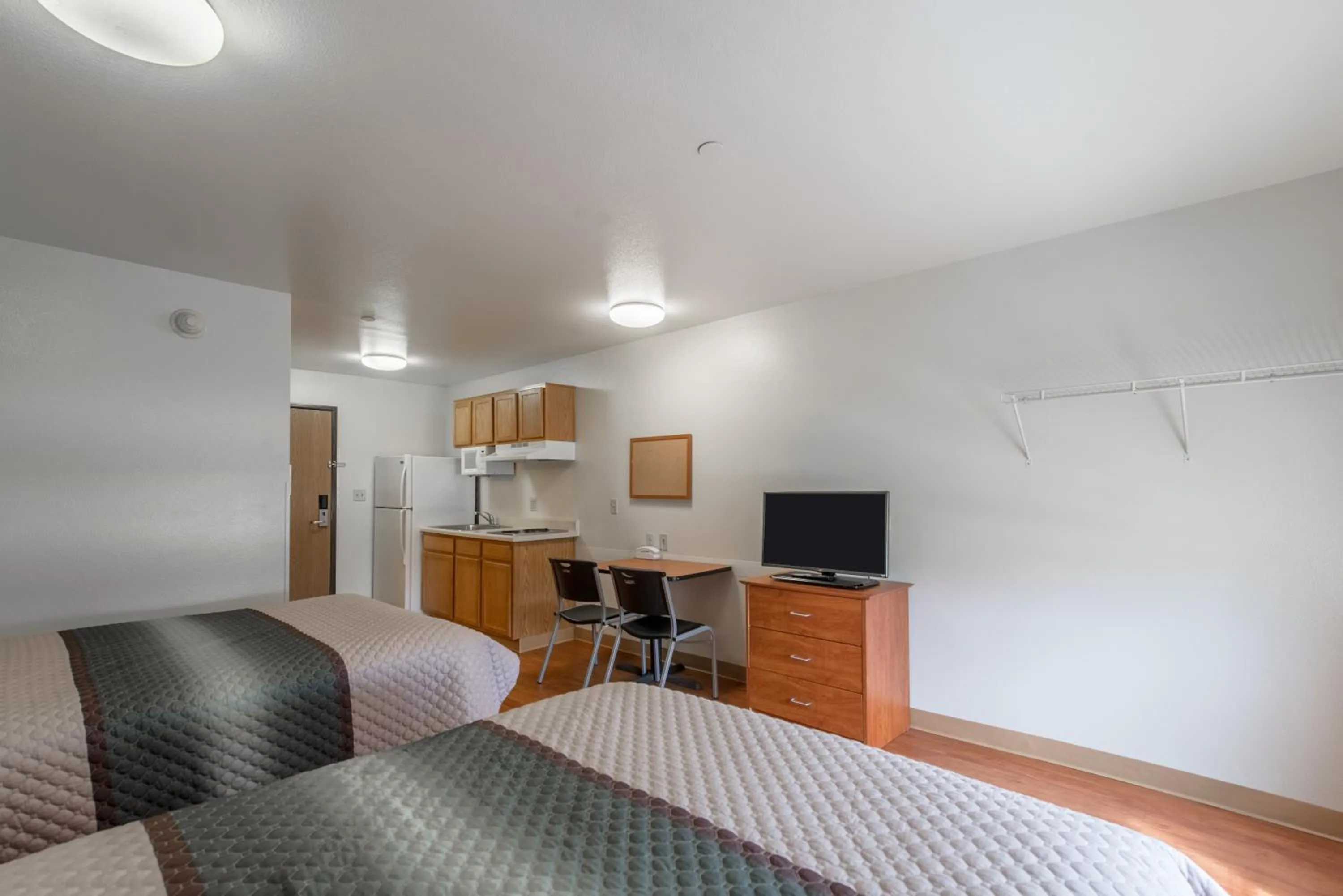 Photo of the whole room, Bed in HomeTowne Studios by Red Roof Columbus