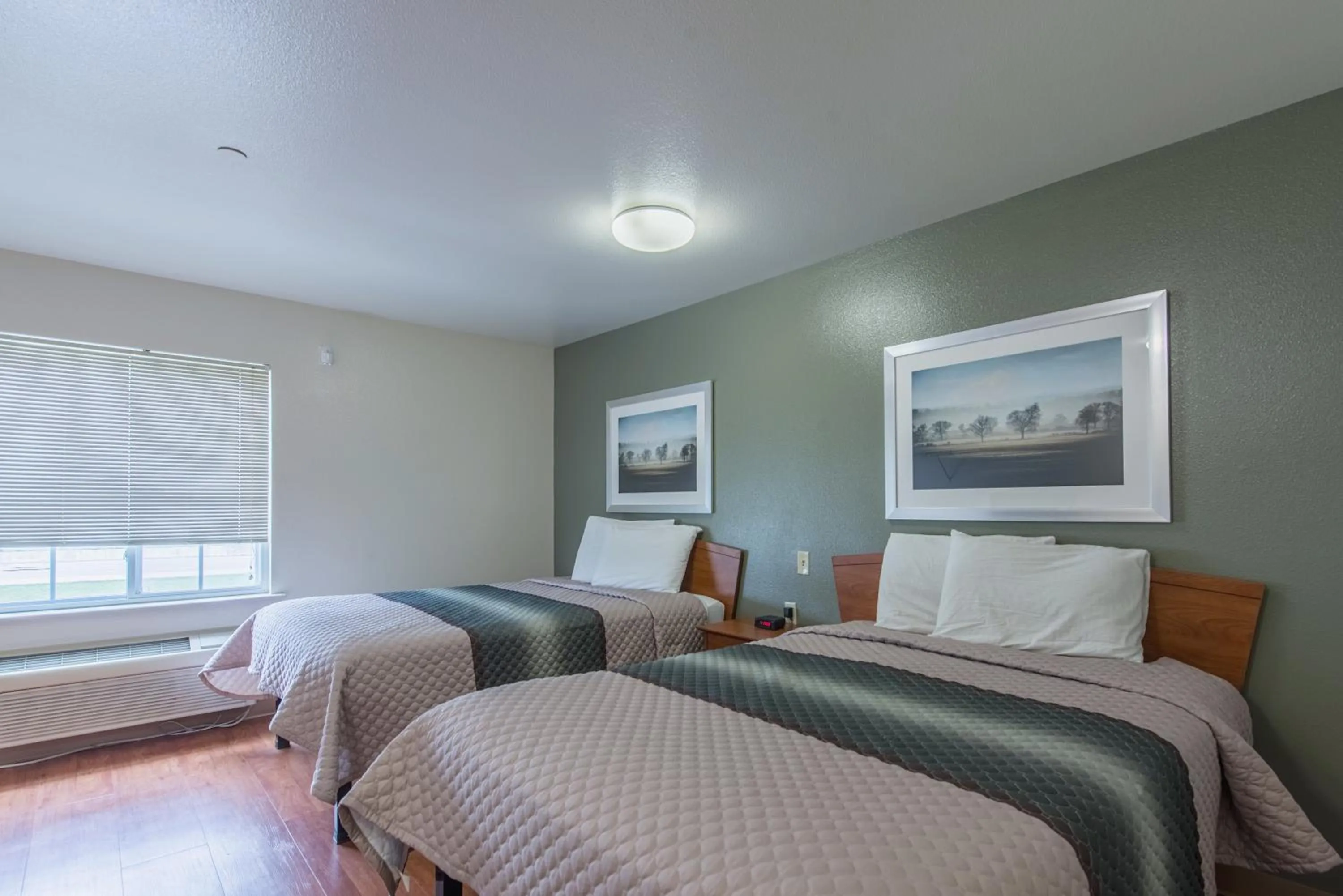 Photo of the whole room, Bed in HomeTowne Studios by Red Roof Columbus