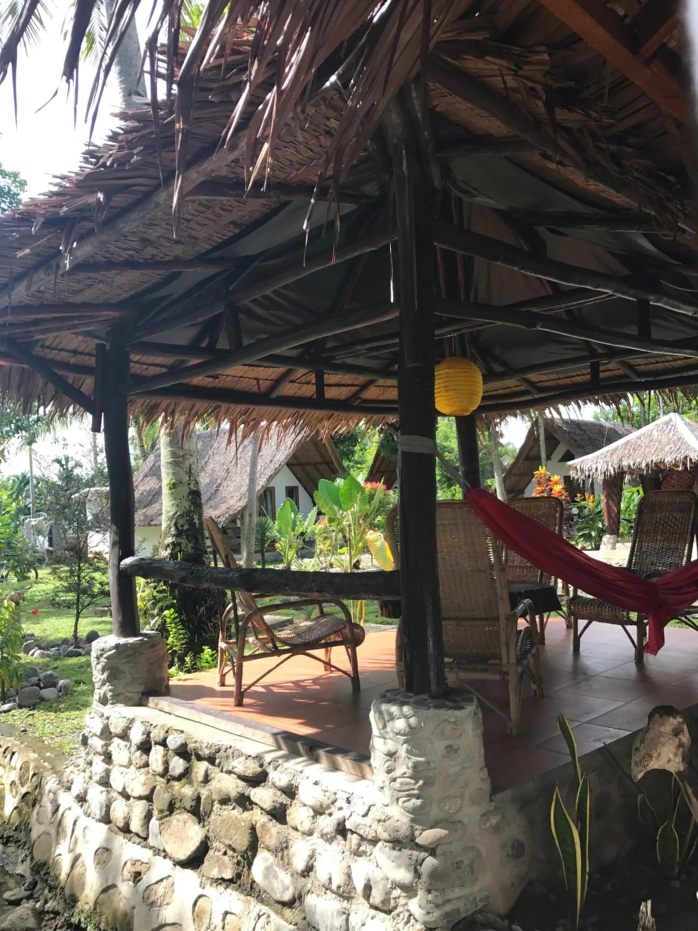 Communal lounge/ TV room in Villa Paradise - Bukit Lawang