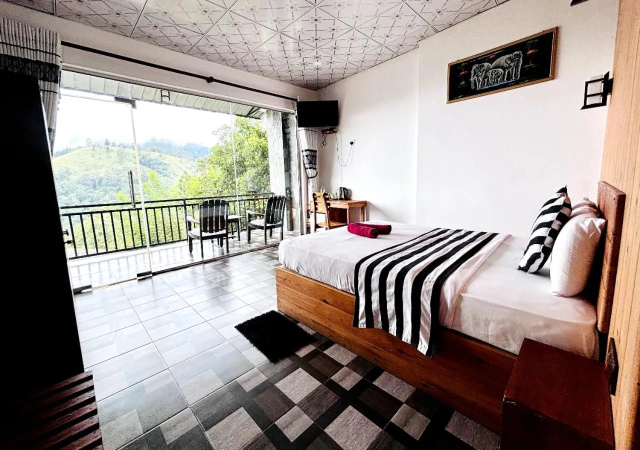 Bed in Paraiso Guest House